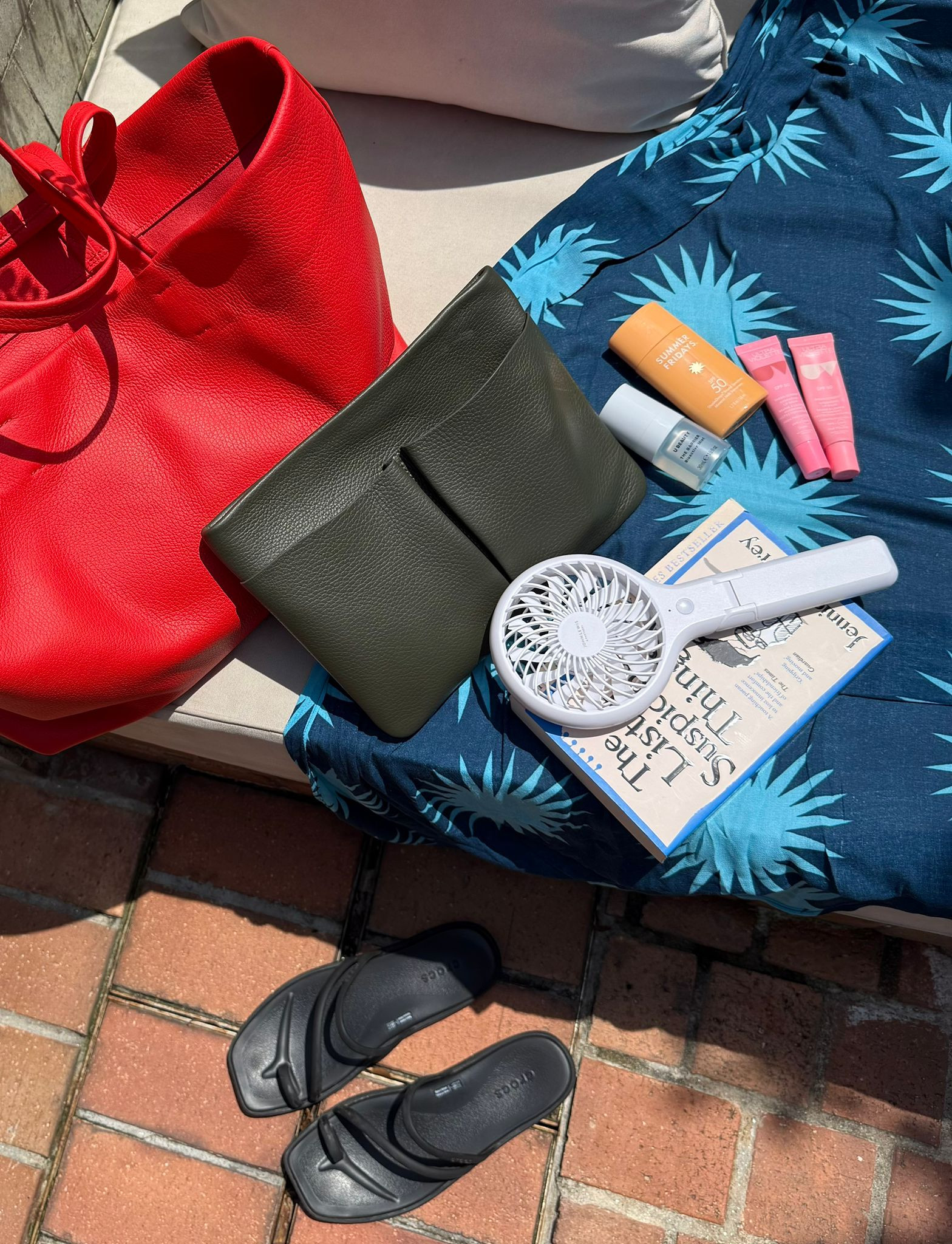 Poolside Holiday Essentials! 

Summer Vacation Must Haves, SPF 50 Sunscreen, Portable Hand Fan, Holiday Read, Lip Balm, Black Slide Sandals, Red Tote Bag 

 #LTKuk #LTKsummer #LTKtravel