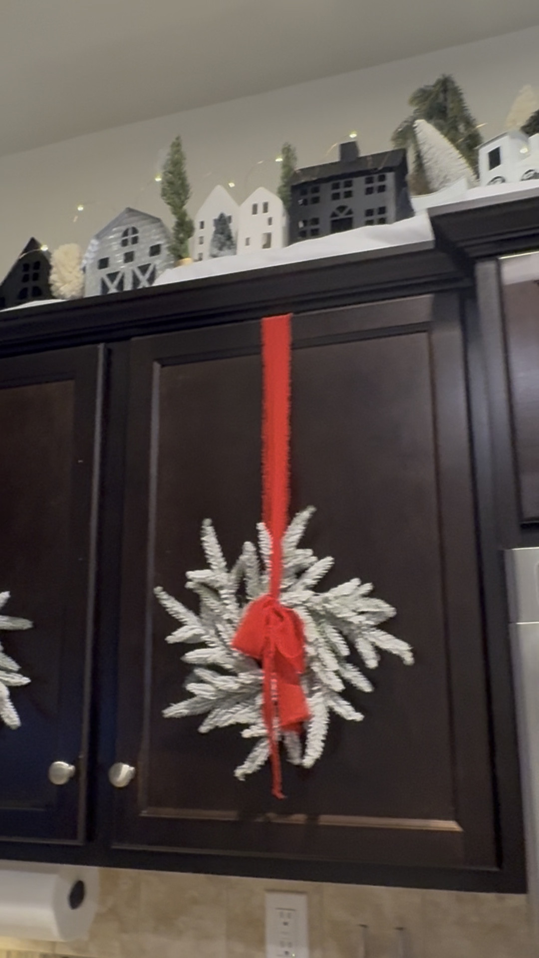 This is one of my favorite part of decorating for Christmas! I love my Christmas village above my cabinets and look forward to setting it up every year. #christmastime #christmasdecor #christmasvillage #homedecor #christmas #decor 

#LTKHoliday #LTKHome #LTKSeasonal