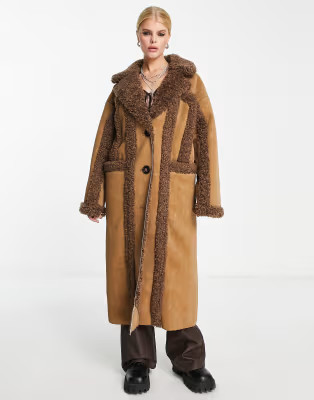 Reclaimed Vintage limited edition longline shearling coat in tan and brown | ASOS (Global)