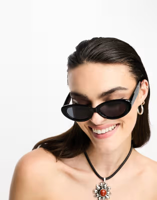 ASOS DESIGN  oval sunglasses in black | ASOS (Global)