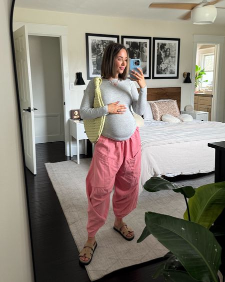 Todays OOTD 🩷 these pink Anthropologie pants are 😍😍😍 I love them!!! Wearing under my bump so they are rolled twice but can’t wait to wear postpartum, too👏🏼 linked up everything 

Steve Madden sandals, shoulder bag, woven bag, shoulder bags, shop talulah basics, anklet 

#LTKfindsunder100 #LTKSeasonal #LTKshoecrush