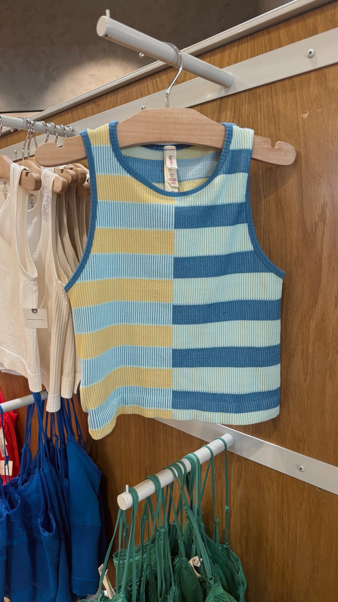 FAVORITE TANK 💛 I own multiple colors. Super high-quality (think thick and stretchy), affordable and unique… just bought this new one! I wear a size S/M.￼

#LTKgrwm #LTKootd #LTKdayinmylife