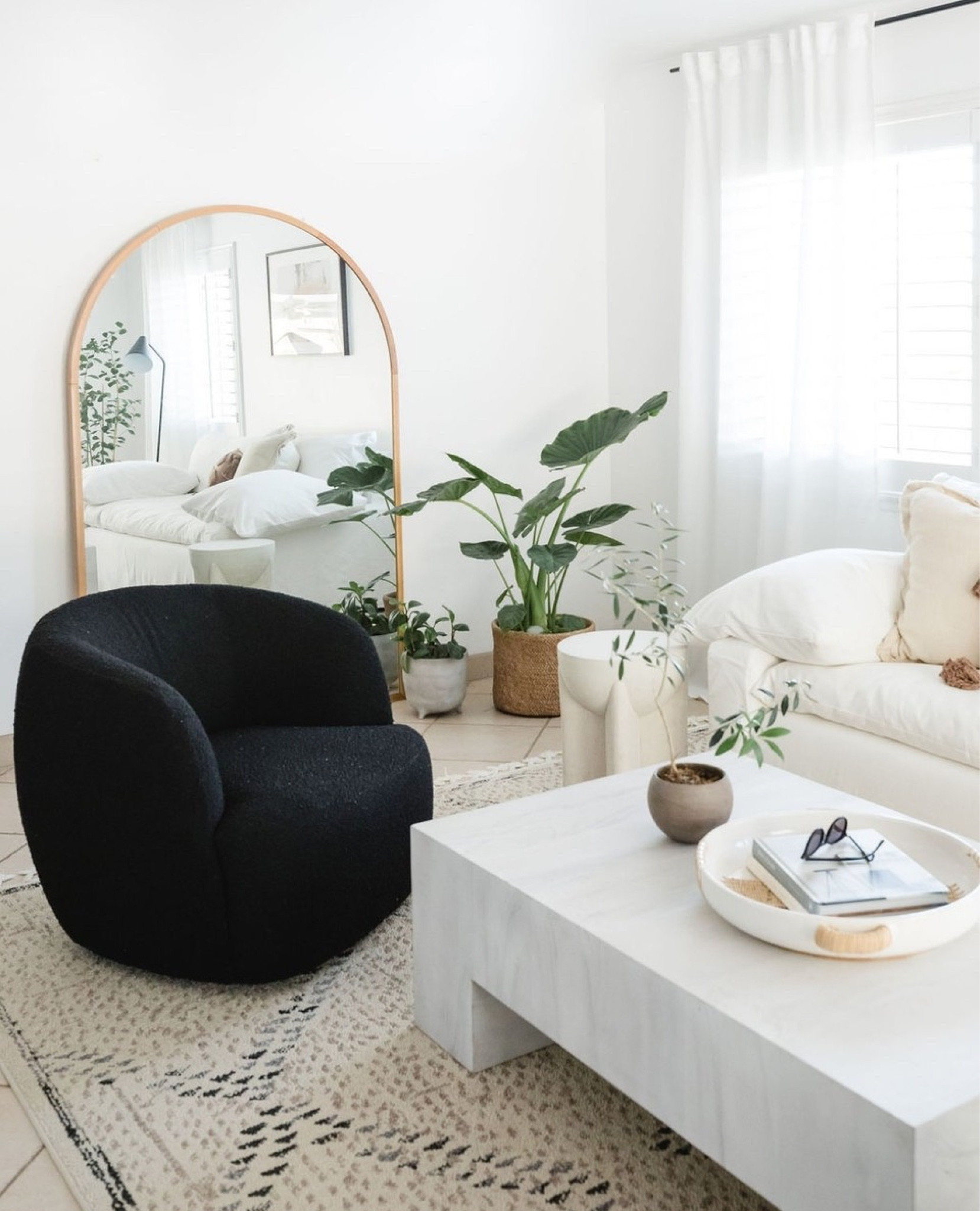 A neutral color harmony living room

Crate & Barrel slip covered sofa, reclaimed coffee table, arc mirror, West Elm stone side table, Moroccan tassel rug, swivel black boucle chair, curtains, curtain rod, woven seagrass basket, tray, and plants. 

Loving room neutral, home finds, living room decor, home decor, family room. 

#LTKFind #LTKhome #LTKstyletip