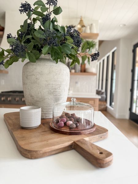 Kitchen island decoration. Vase and stems are from Hobby Lobby. I listed similar ones below. Cutting board, Pastry dish, candle.

#LTKhome