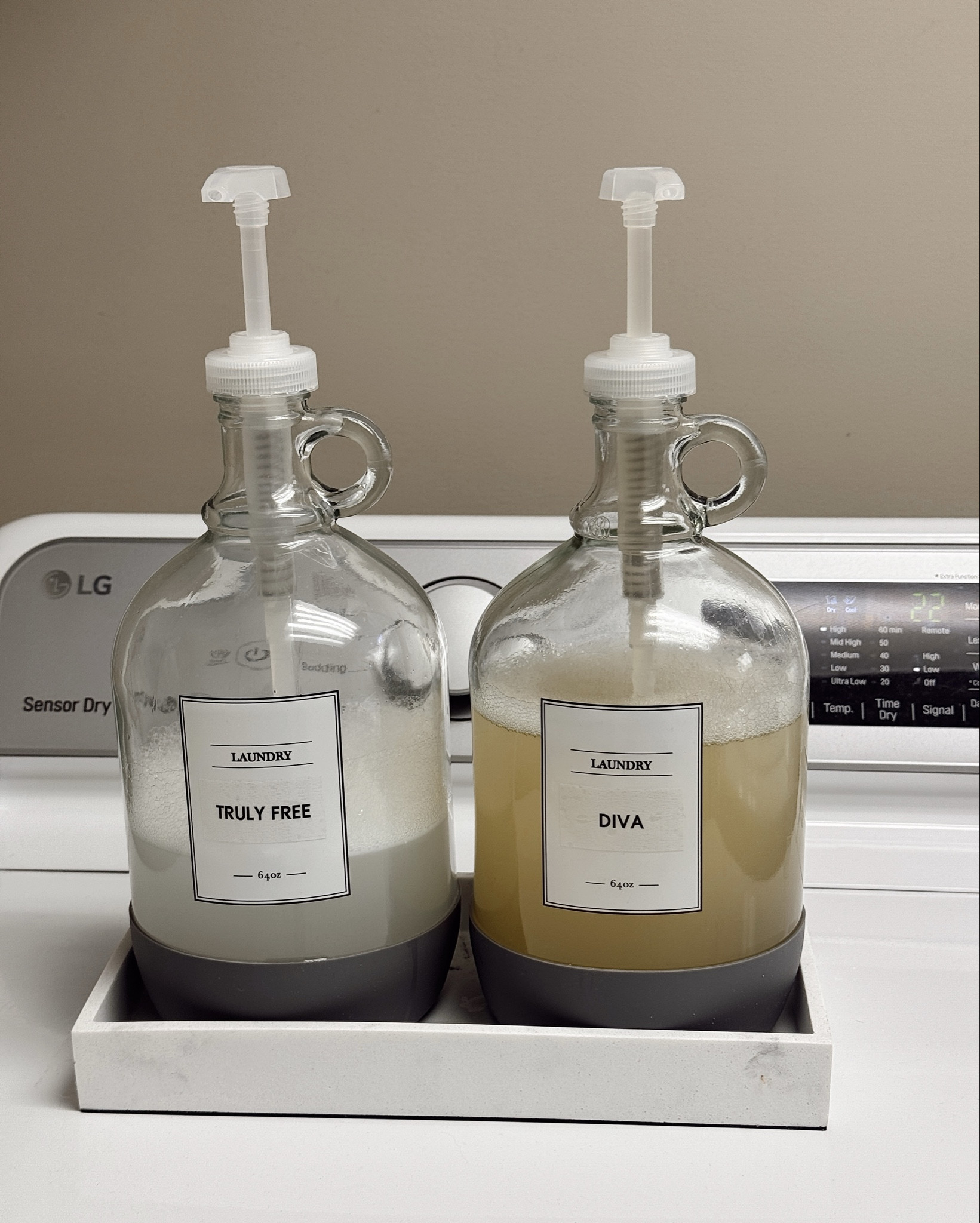 Spruce up your laundry room with these glass dispenser jars! 
Also sharing a few other favorites that helps make laundry more efficient 🧼🧺

Home organizing, laundry organizing, laundry room, laundry room organization, laundry detergent, liquid detergent, glass containers, Better Homes & Garden, Walmart home organization 

#LTKFamily #LTKFindsUnder50 #LTKHome