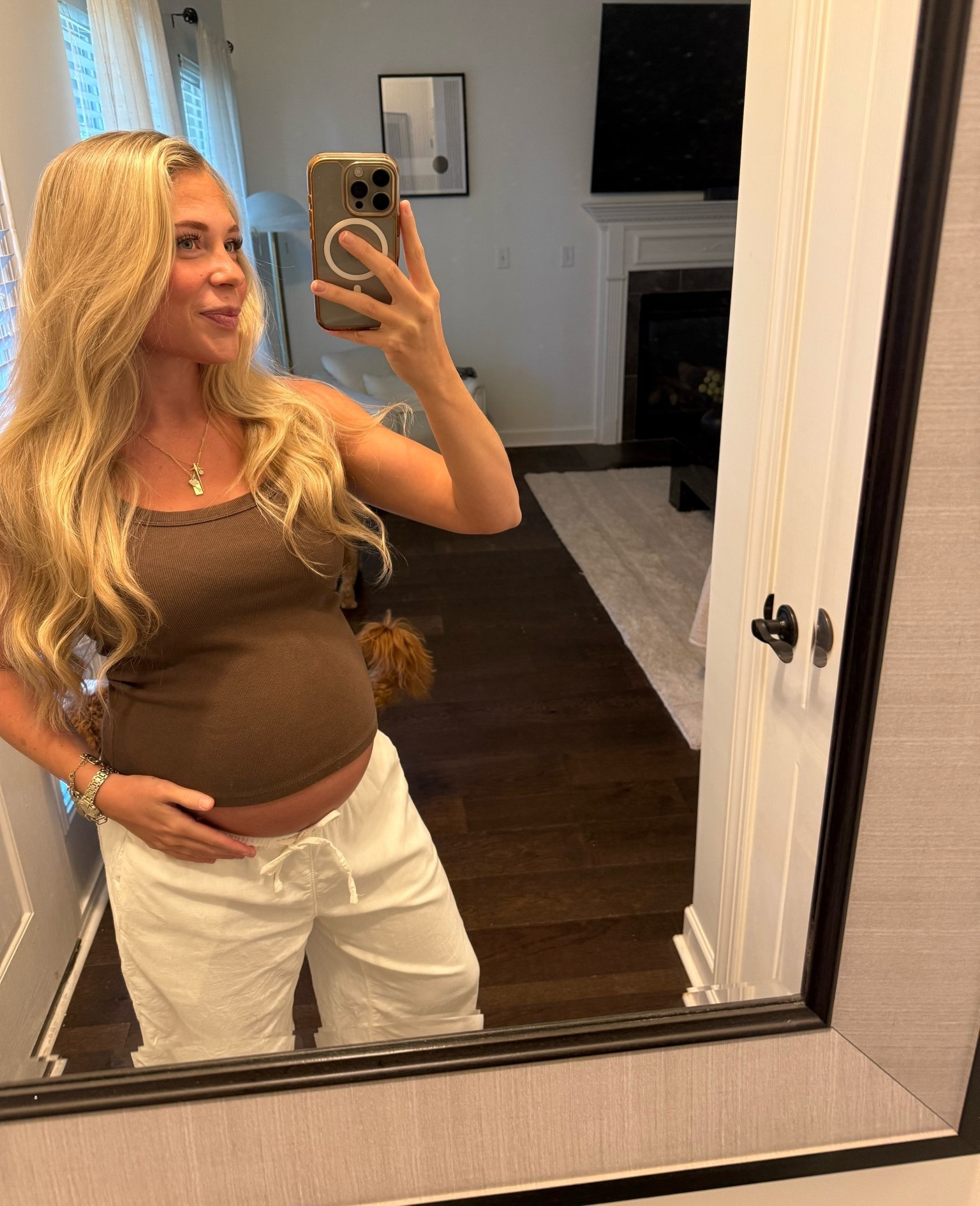 This is my go to pant! Tops was a steal too. Artie + American eagle have been loyal to me during this pregnancy 🫶🏼 Small in bottoms & Medium in Tank

#LTKBump #LTKmomlife #LTKootd