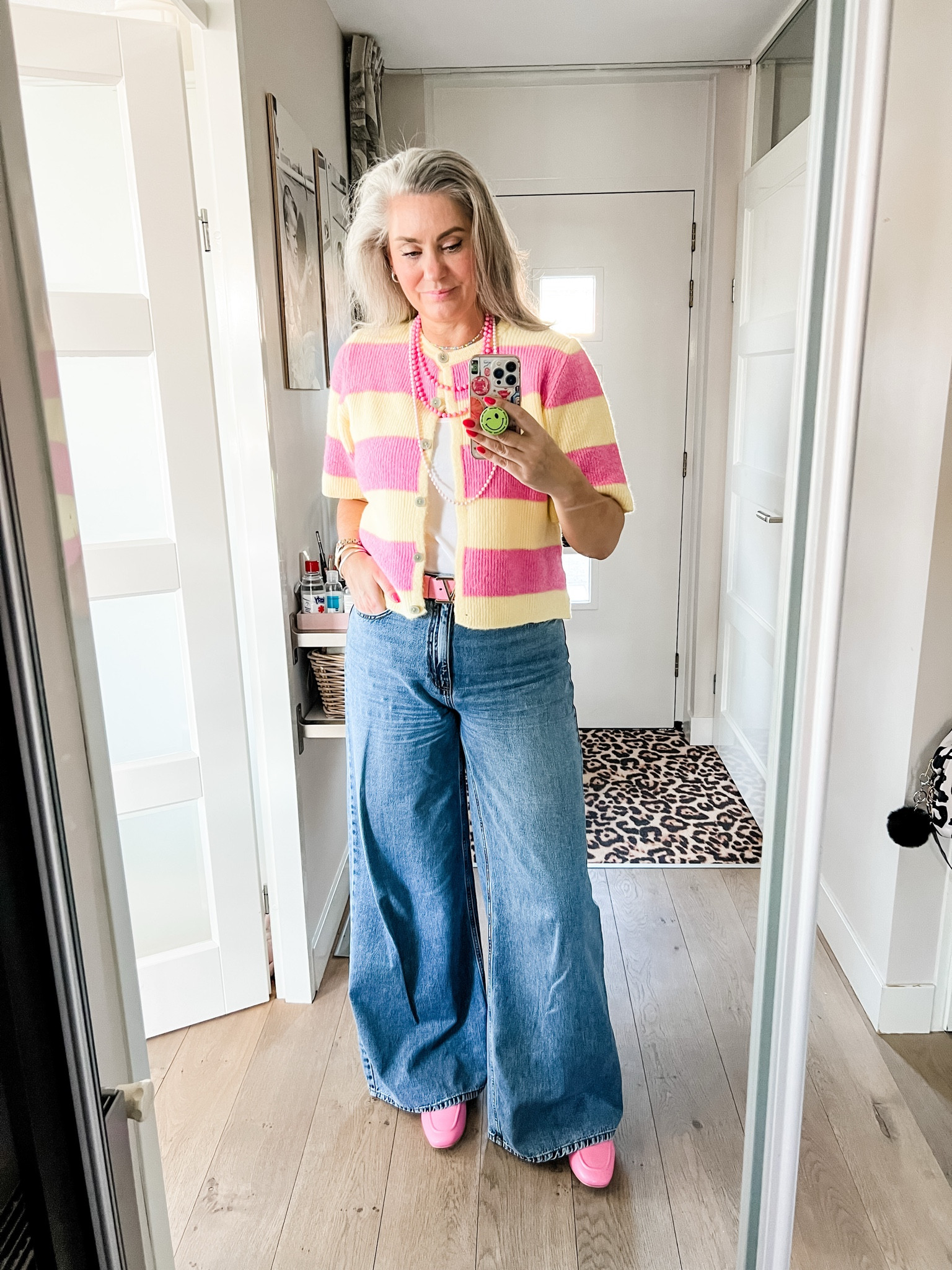 Ootd - Sunday. Pink and yellow striped cardigan (local boutique) over a basic white tank top paired with super wide leg jeans and pink loafers. 

#LTKspring #LTKeurope #LTKnederlands