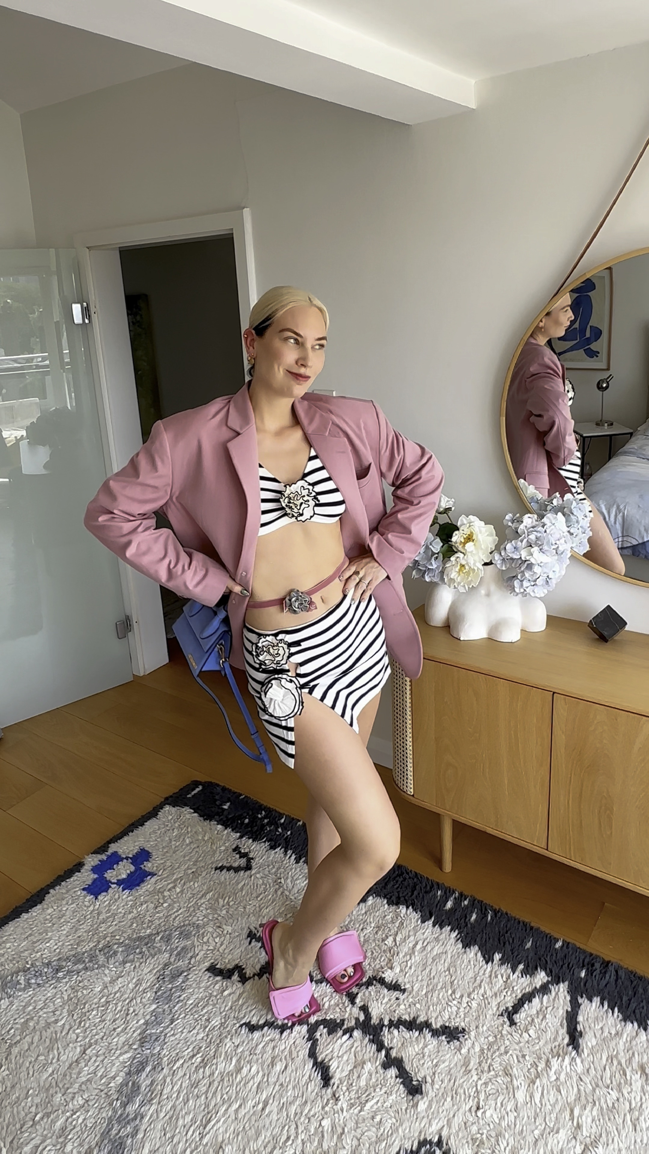 This striped set from Gaultier is so cute – it’s giving me French Riviera vibes. Unfortunately I’m not in Saint-Tropez but in London so added a dusty pink oversized blazer to transform this outfit into a city look. A flower belt adds extra fun and the easiest DIY: you just need a ribbon and fabric flower 🌸 

#LTKeurope #LTKstyletip #LTKSeasonal