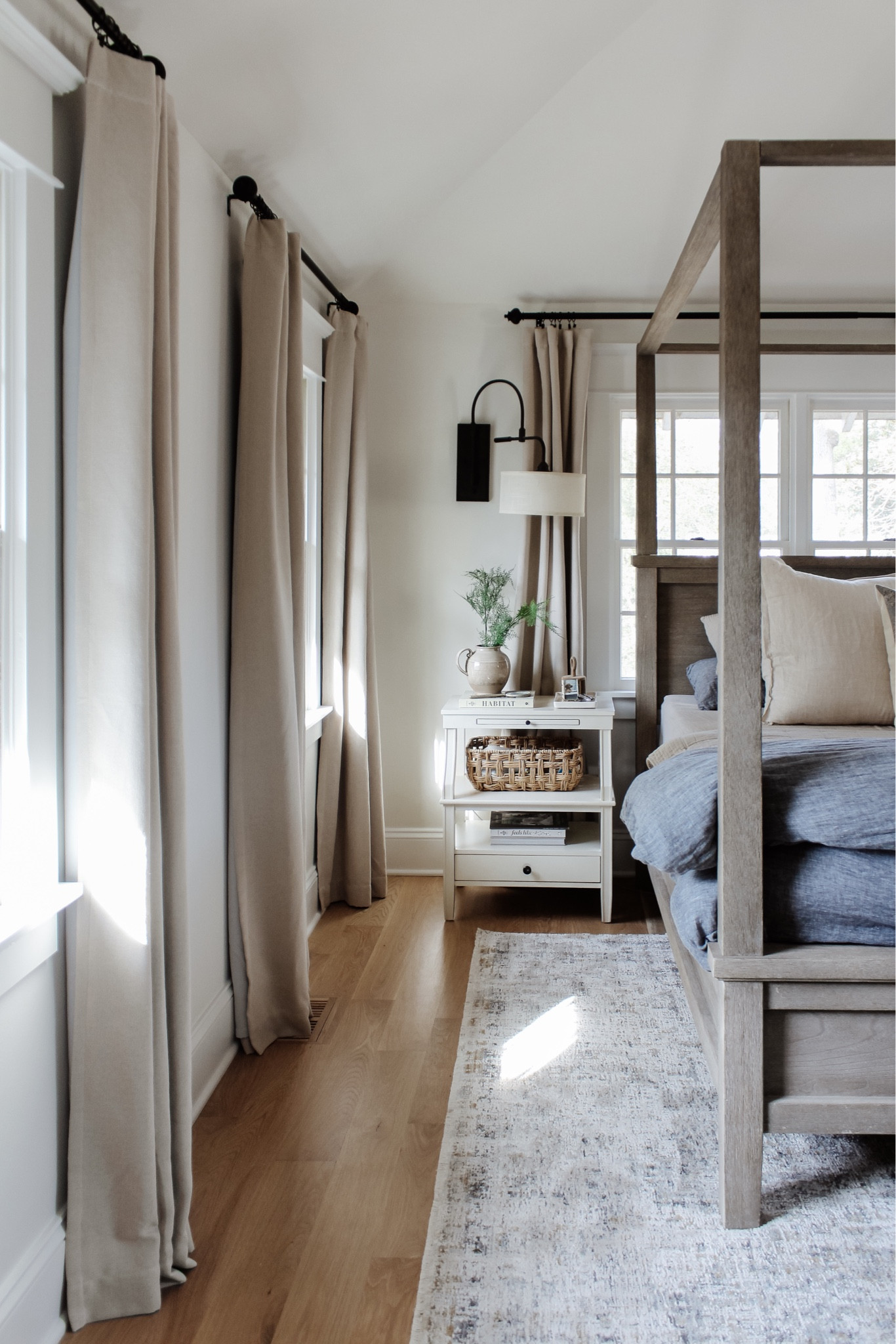 Just a little peep at the current state of our primary ✨ On another note, this week’s affordable new arrivals are SO good and you can easily shop the wide range of decor + furniture all from the link in bio.
•
Shop my bedroom, read the blog and much more from there too! Message me with any questions.
•
•
•

4 poster wood bed, natural tone wood bed, canopy bed, linen duvet, stripe euro shams, floral decorative pillow, bed pillows, pillow inserts, cotton gauze quilts, layered bedding, nightstand decor, white two shelf nightstand, affordable furniture, quick ship furniture, swing light, nightstand wall light, affordable curtain, neutral bedroom, bedroom decor, black curtain rod, vintage decor, Target home, woven basket, lumbar pillow, floral throw pillow cover, blue bedding  

#LTKstyletip #LTKsalealert #LTKhome