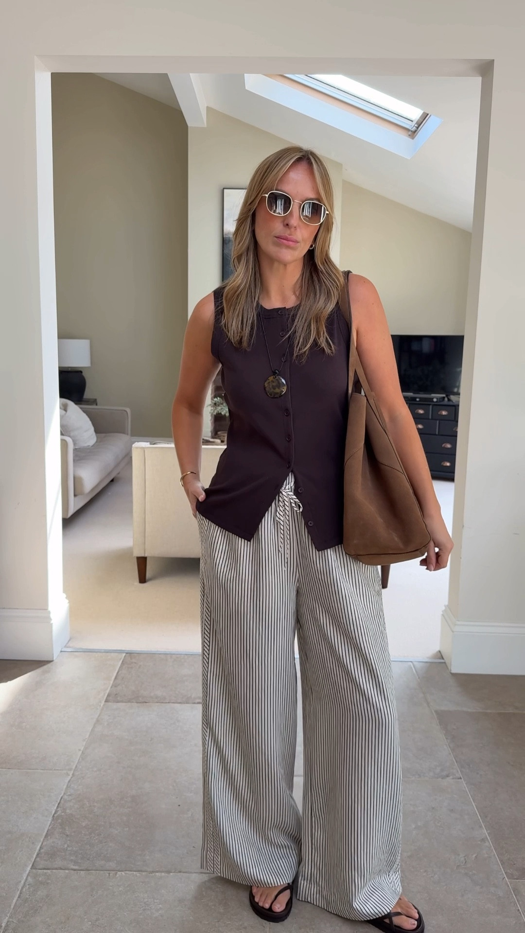 Still playing around with that Hush Co ord — using he trousers here and styling with this lovely jersey vest - button through - cut away hem 

Trousers - large 
Top - large 

#LTKworkwear #LTKtravel #LTKsummer