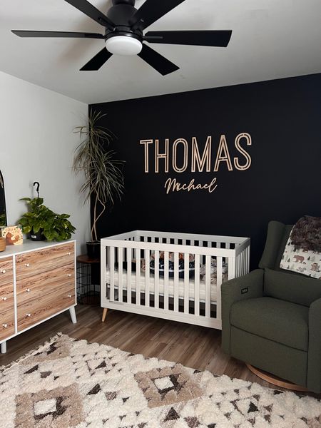 Our neutral baby boy nursery is just about complete thanks to this custom baby name nursery sign 🖤

Nursery theme, baby boy nursery, baby nursery, white crib, neutral nursery, black nursery, natural wood, babyletto electronic recliner and glider 

#LTKunder100 #LTKbaby #LTKhome