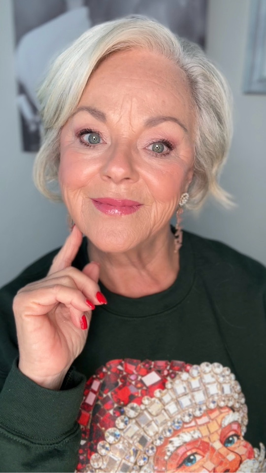 It’s Day 7 of the 12 Days of Christmas Glam, and today I went all in with rose, berry, and pink tones — such a gorgeous trio for the holiday season and perfect with my Christmas shirt! I brought back an old favorite, the Haus Labs Triclone Foundation, and paired it with new finds I’m obsessed with: the Rare Beauty Matte Bouncy Blush and Laura Mercier lip liner, lipstick, and bronzer. Everything blended so beautifully!
✨ Glam Tip: For a soft, glowing shimmer on the eyes, grab your favorite highlighter — it gives the prettiest sparkle every time. 

#LTKOver40 #LTKBeauty #LTKHoliday