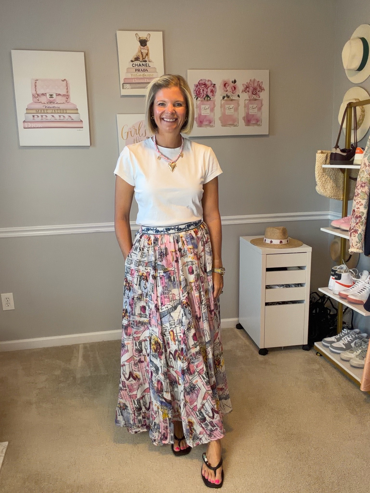 Basic white T TTS
Flowy maxi skirt with pockets and elastic waist TTS (I’m wearing a small)
Beaded brown sandals TTS

#LTKTravel #LTKWorkwear #LTKOver40