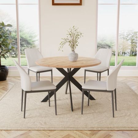 Shop dining table sets! The Kiayanna 46.4" Round Table Metal Legs Dining Table Set with 4 Dining Chairs is under $500.

Keywords: Dining table, dining table set, dining chairs, dining room

#LTKSaleAlert #LTKHome #LTKSeasonal