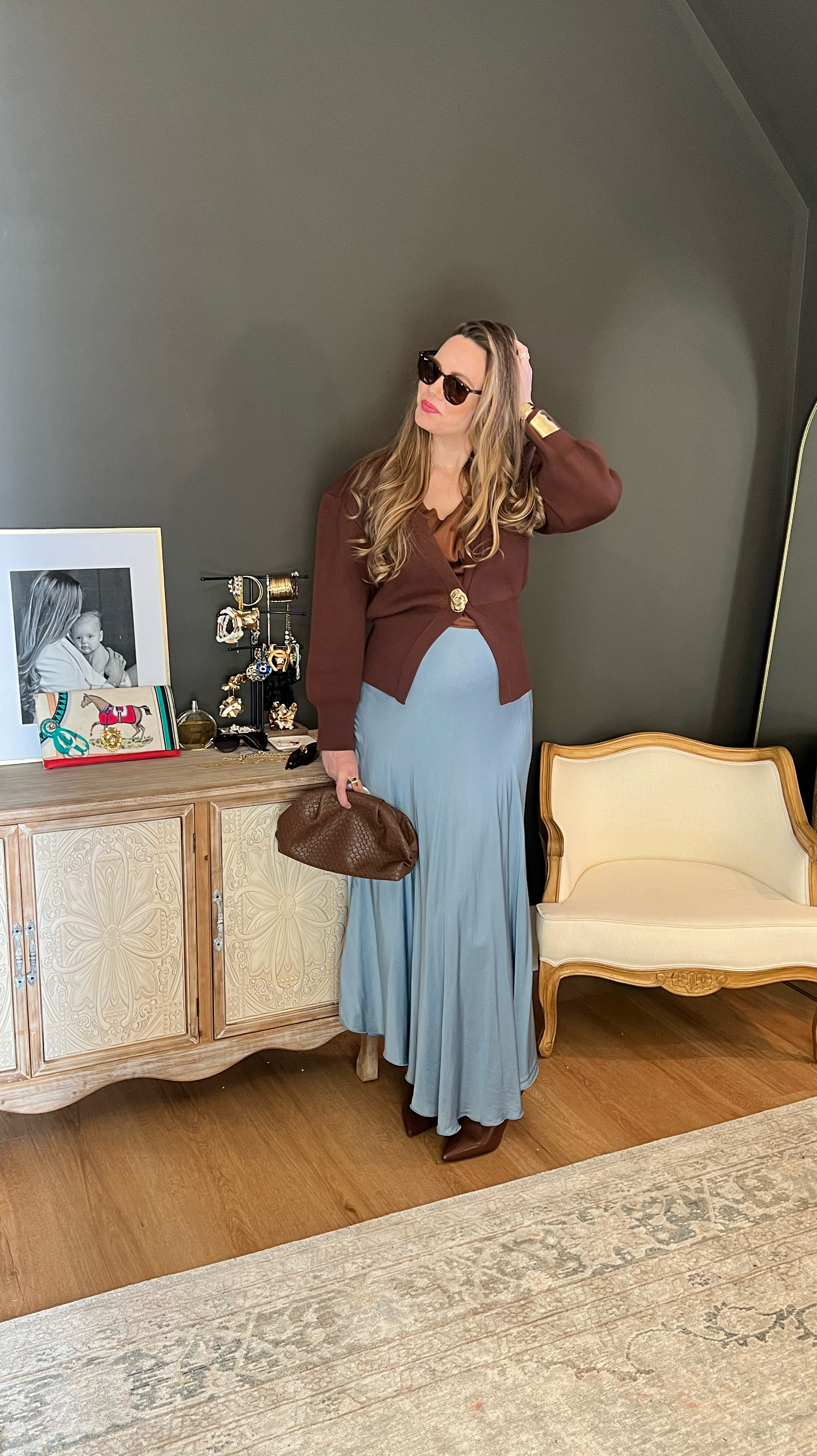 Perfect transitional outfit that’s bump friendly! Chocolate brown and Baby Blue are so luxurious together and the perfect color combination for the winter-to-spring transition. The baby blue softens the look and brings in a spring feeling while the chocolate brown keeps it grounded and sophisticated. This viral cardigan is perfect paired with my favorite closet staple — a maxi skirt — and this one has enough stretch for the bump and flow to feel good! 

#LTKWorkwear #LTKStyleTip #LTKBump