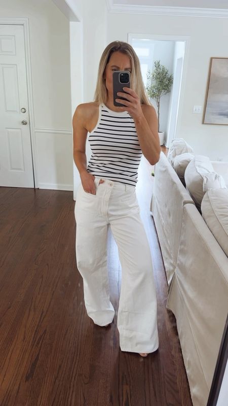 Small in stripe tank
TS in white jeans

#LTKVideo #LTKsalealert #LTKxMadewell