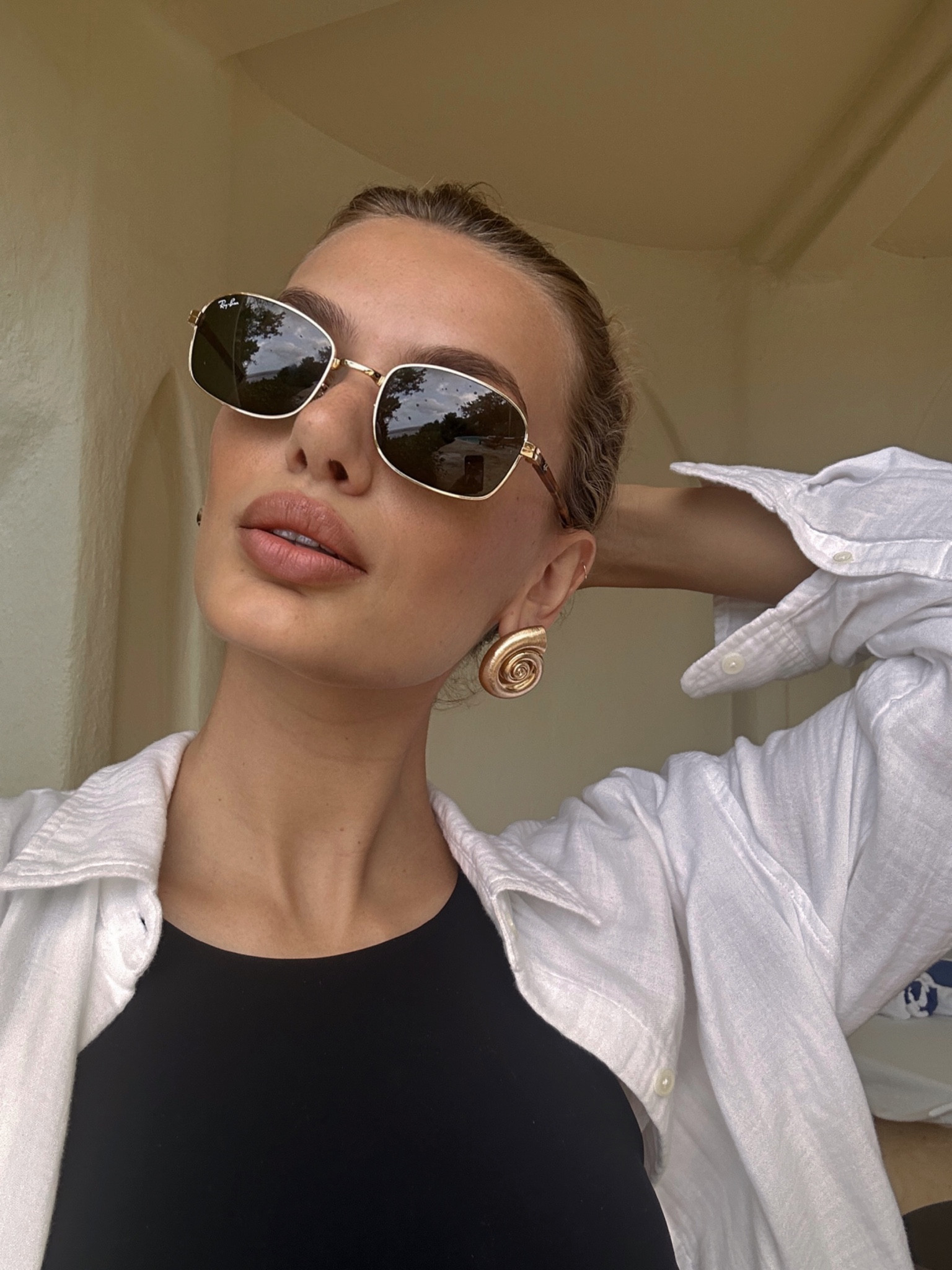 Shell earrings 

#LTKFind #LTKSeasonal #LTKstyletip