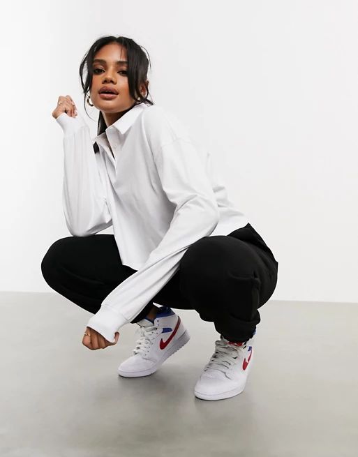 ASOS DESIGN boxy crop polo with long sleeve in white | ASOS (Global)
