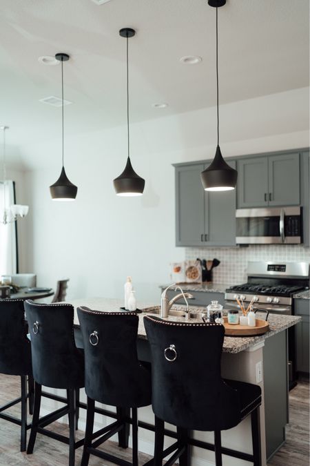 Modern living room decor | black kitchen pendant lights, black velvet barstools, Amazon kitchen cabinet handles.

#LTKfamily #LTKhome