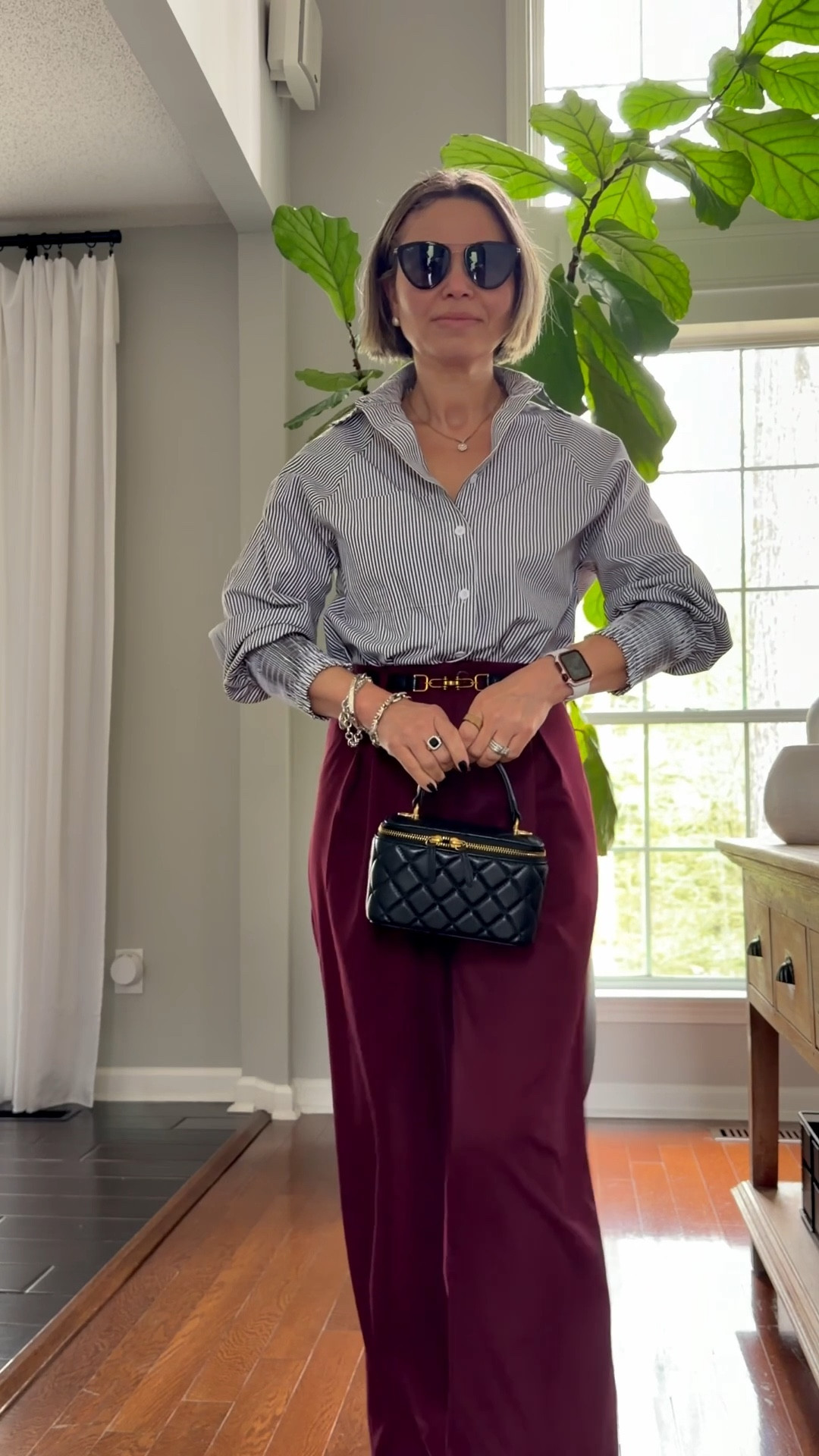 spring outfits 2026
A black and white pin-stripe button-down shirt paired with burgundy trousers, a thin belt, a mini bag, and jelly flats.



#spring #workwear #outfit #inspiration  

#LTKPetite #LTKOver40 #LTKSeasonal