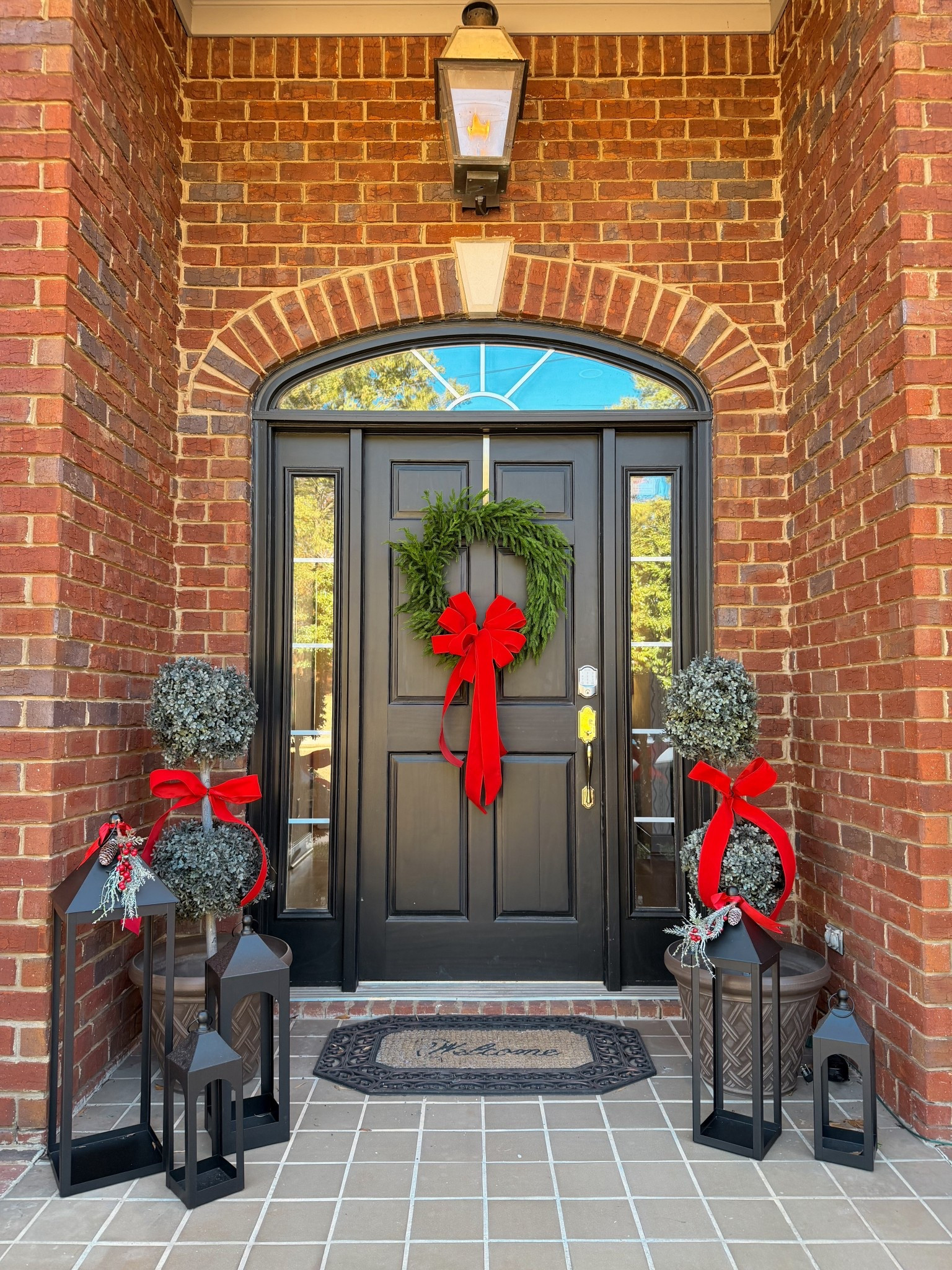 Classic traditional Christmas holiday front porch decor Amazon and Walmart #budgetfriendly #holidaydecor 

Love the faux topiary trees with bows on them and these black lanterns

#LTKFindsUnder50 #LTKFindsUnder100 #LTKHoliday