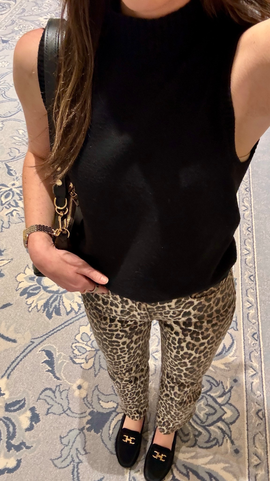 weekend outfit of leopard jeans, a black sleeveless turtleneck, & black suede loafers 🤎 

#LTKSeasonal #LTKHoliday #LTKootd