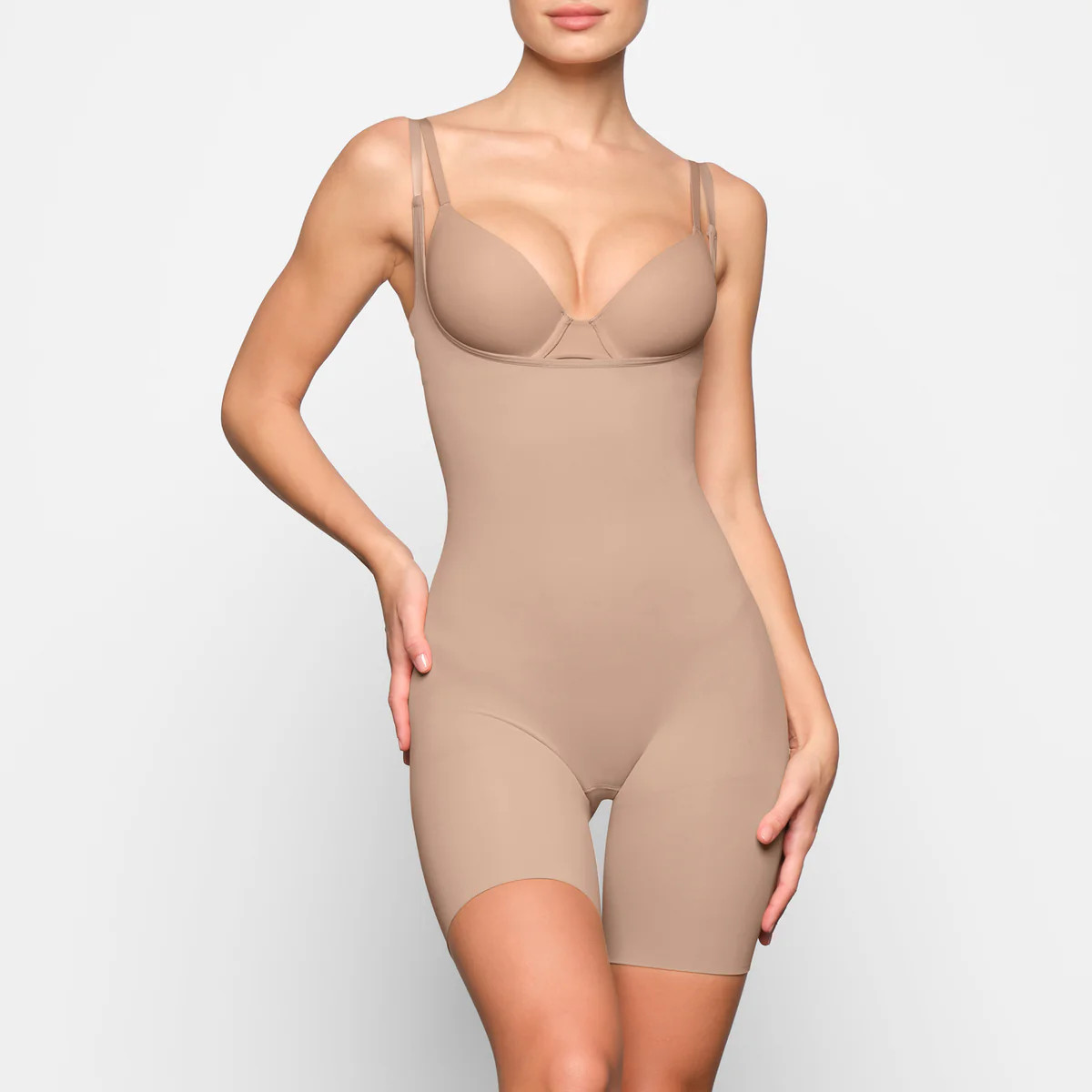 BUTT ENHANCING OPEN BUST BODYSUIT | SKIMS (US)
