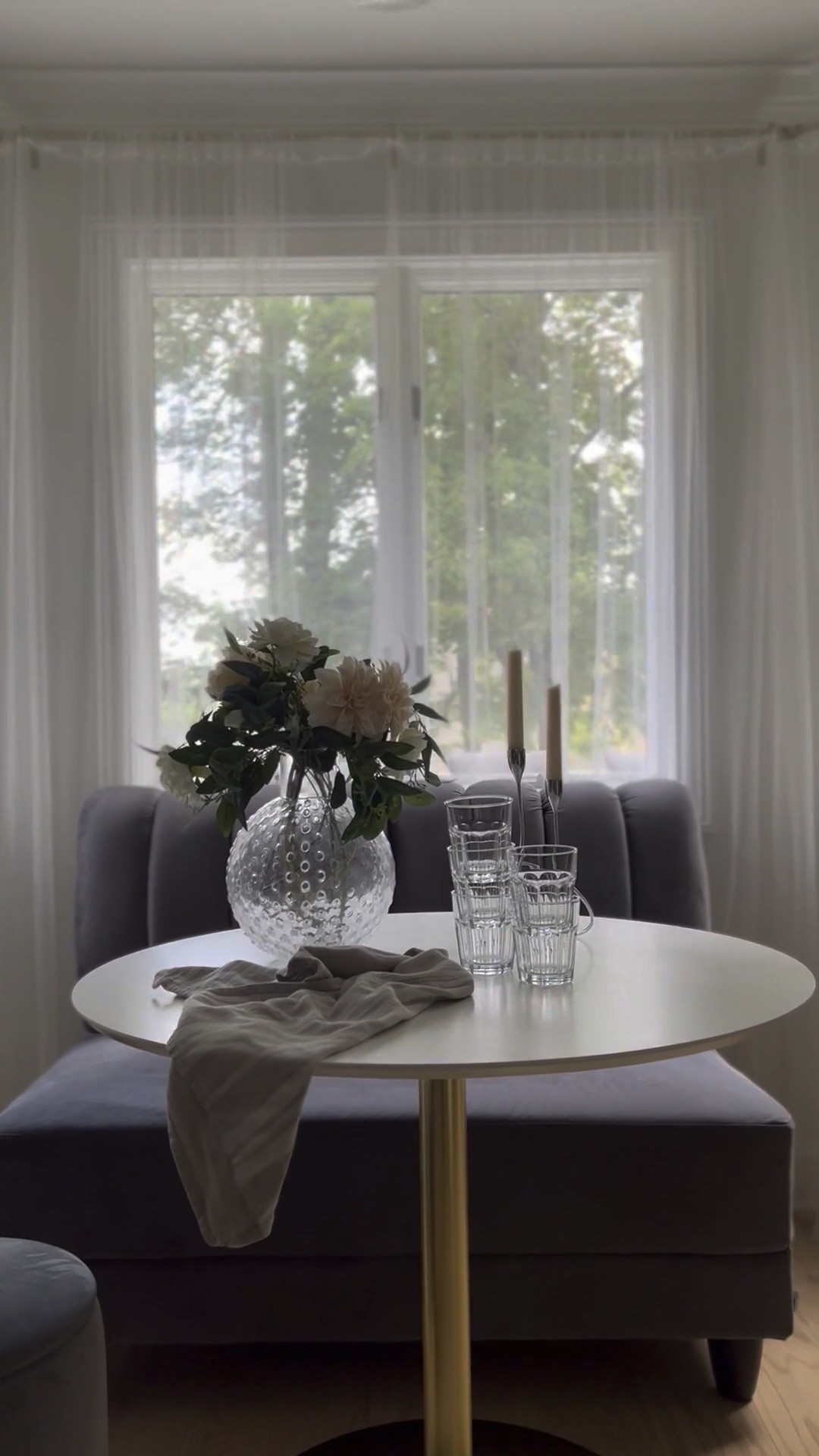 Creating a cozy breakfast nook in this bay window has completely transformed this corner of our home. 

The round tulip table with a brass leg brings in a timeless modern touch, while the velvet ottoman stools make it easy to add flexible seating for family meals or morning coffee (plus extra hidden storage — because the lids open!). 

I love how the armless velvet sofa anchors the space, giving us that built-in banquette look without the construction. 

This nook is the perfect mix of comfort and style — a dining space that feels elevated but still warm and welcoming. 

#LTKSeasonal #LTKParties #LTKHome