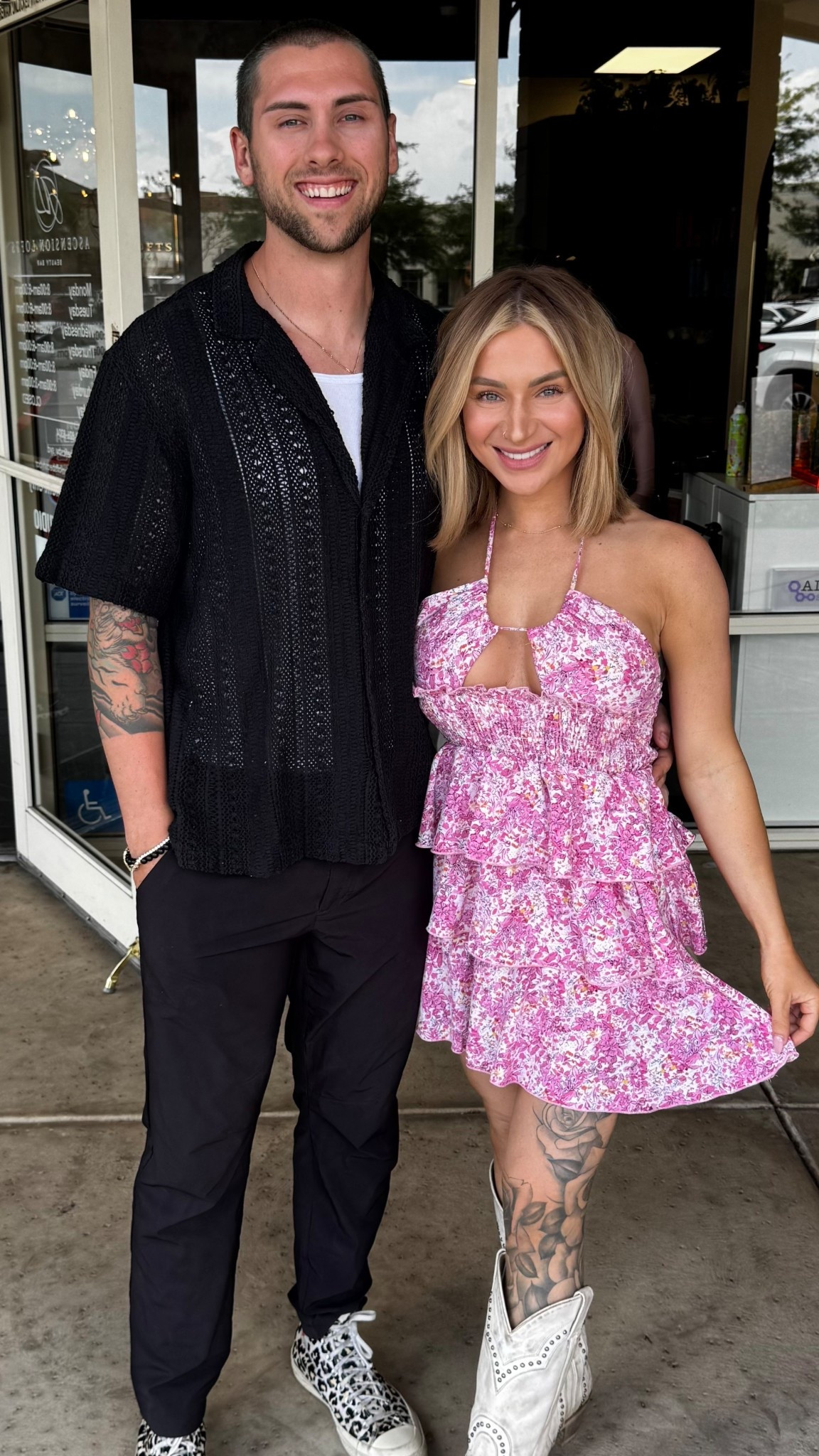 His look: breezy black knit button-up, tailored black pants, and statement leopard sneakers.
Her look: flirty floral halter mini dress paired with standout white studded cowboy boots. #CoupleStyle #OOTD #StreetStyle #SummerOutfit #DateNightStyle #MensFashion #WomensStyle #OutfitInspo #LikeToKnowIt #LTKStyle


#LTKMens #LTKParties