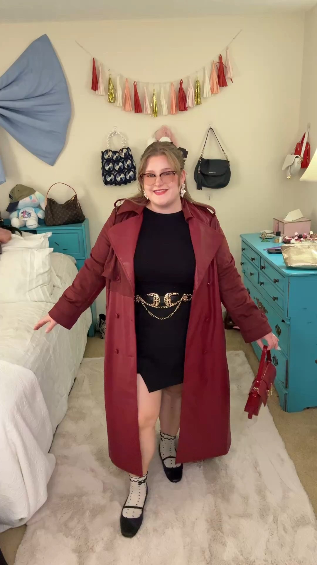 I love this faux leather burgundy trench to add some color to a classic black outfit (plus this belt elevates the look too!) I’m a size 16 wearing XL or 1x in all items. 

✨ a little curvy girl outfit inspo 

#LTKMidsize #LTKootd #LTKPlusSize