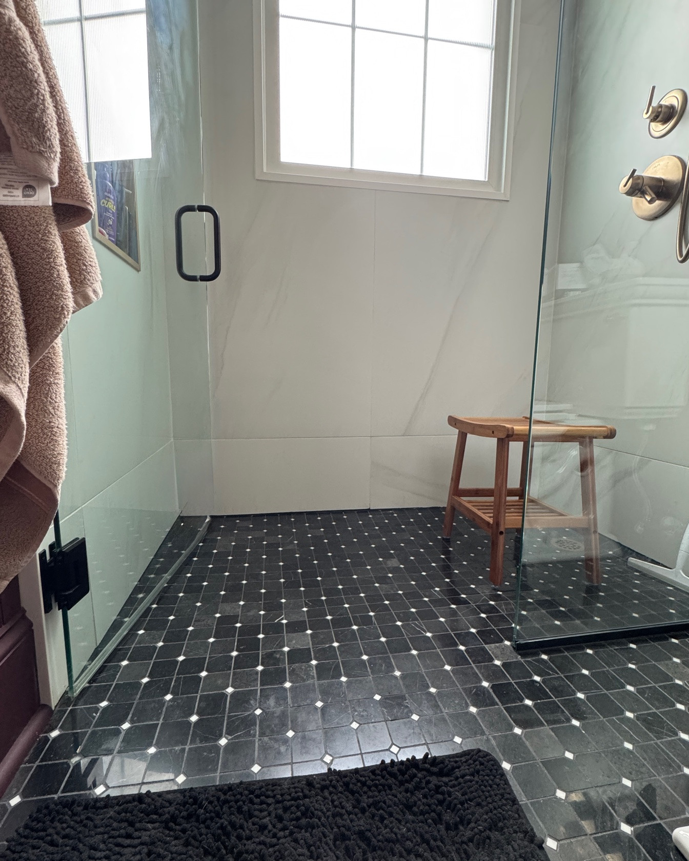 It’s the little things. I recently had surgery and so thankful we had planned ahead when renovating this bathroom! 

- Zero threshold shower
- Tile running the length of the bathroom
- A wand for your shower (not just the shower head) 
- towels down low
- niche holds shampoo and such at a lower space 

This has helped me so much! 

#aftersurgery #LTKrenovation