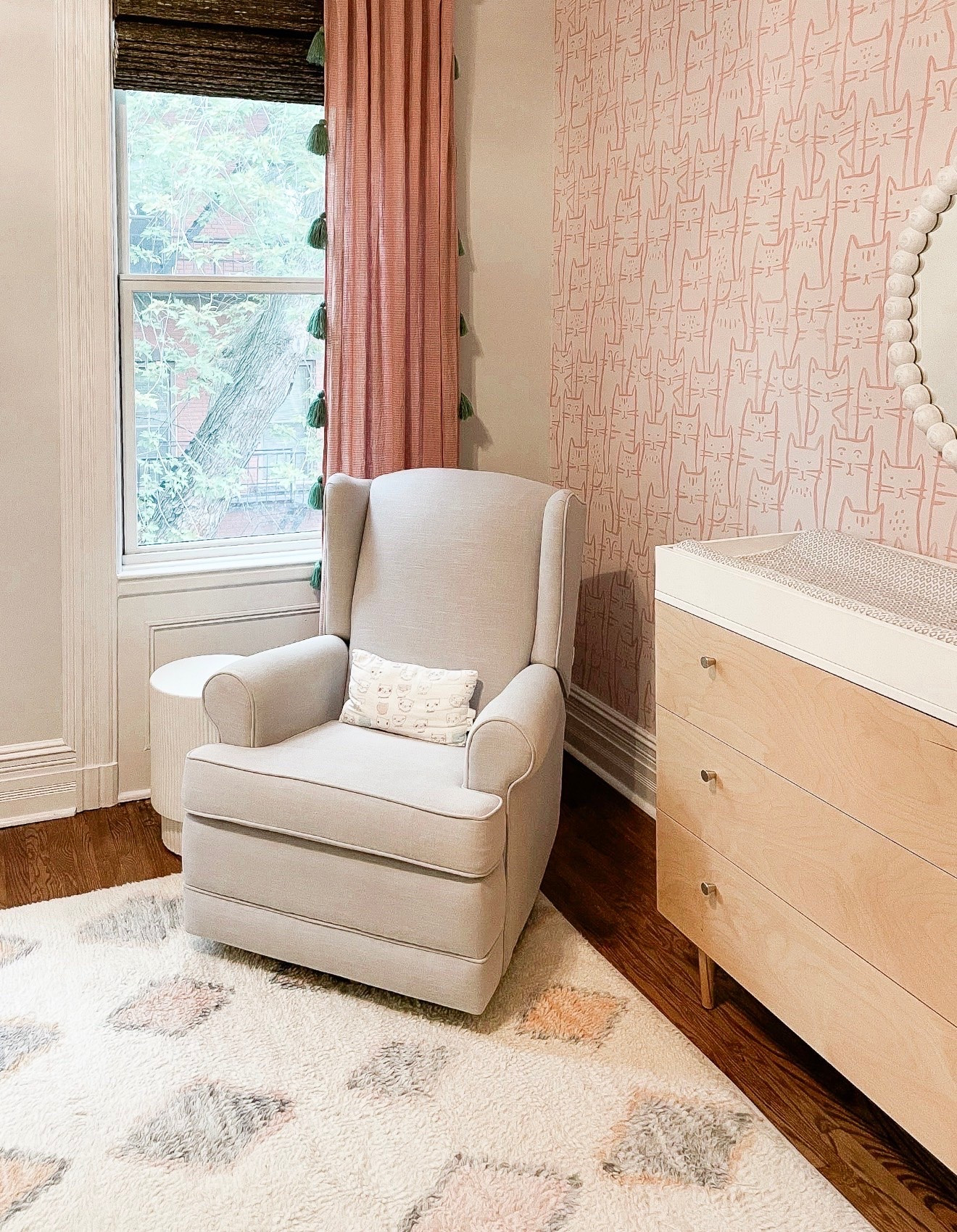 This room is such a fun reminder that pattern can still feel soft. The cat wallpaper adds personality, while the rug and small pillow bring in additional prints without taking away from the calm pink and neutral palette.

cat wallpaper, nursery decor, pink nursery, patterned rug, kids room decor, pattern mixing, nursery inspiration, wallpaper ideas, interior styling, Girl on the Hudson

#LTKHome