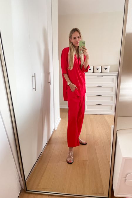 Love this bold red coverup set for the summer ❤️❤️❤️ Sold separately and also shorts match in case you don’t want the pant. Top runs big, so I recommend sizing down 1 size. I am wearing an xs top and sm bottom. Comes in red, black, white and beige! 
Sandal- the Row but linking something similar! 