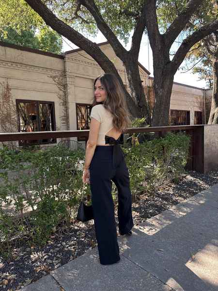 Open back top for summer! How cute is this one with the bow detail? I’m wearing a size S in the top & a 25 in the pants. My shoes run TTS. // Revolve, Abercrombie, summer outfit, summer top