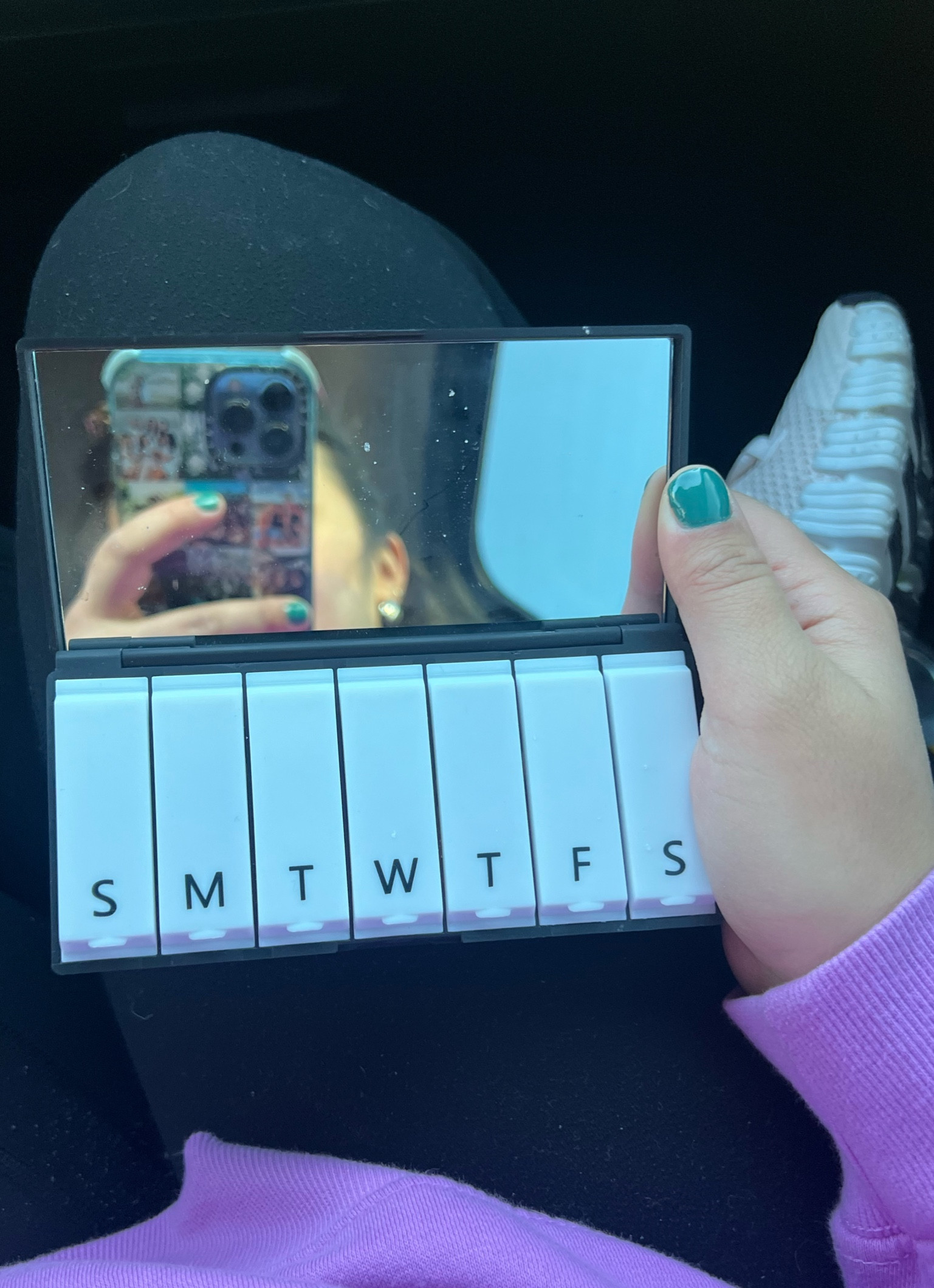 Okay but actually such a good idea to put a mirror on this pill organizer because mirrors in my makeup bag get covered in product so quick. 