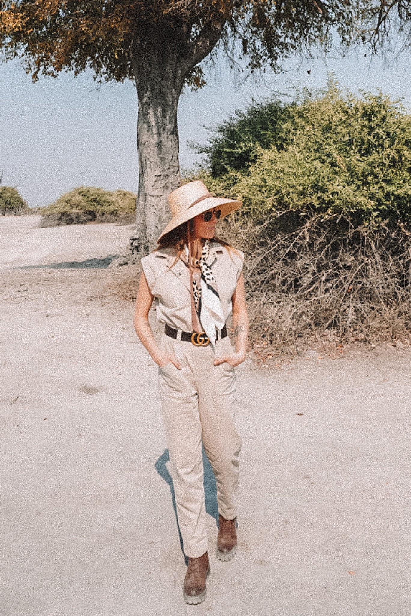 This Revolve jumpsuit is everything for safari life 🦁
Jumpsuit can be dressed up with Gucci belt, silk scarf, or fun shoes. 
For safari, I went with Sam Edelman combat boots, but this would look cute with a low heel too. 
Scarf is vintage Christian Dior, so I linked good alternatives for ya 🫶

#LTKstyletip #LTKHoliday #LTKtravel