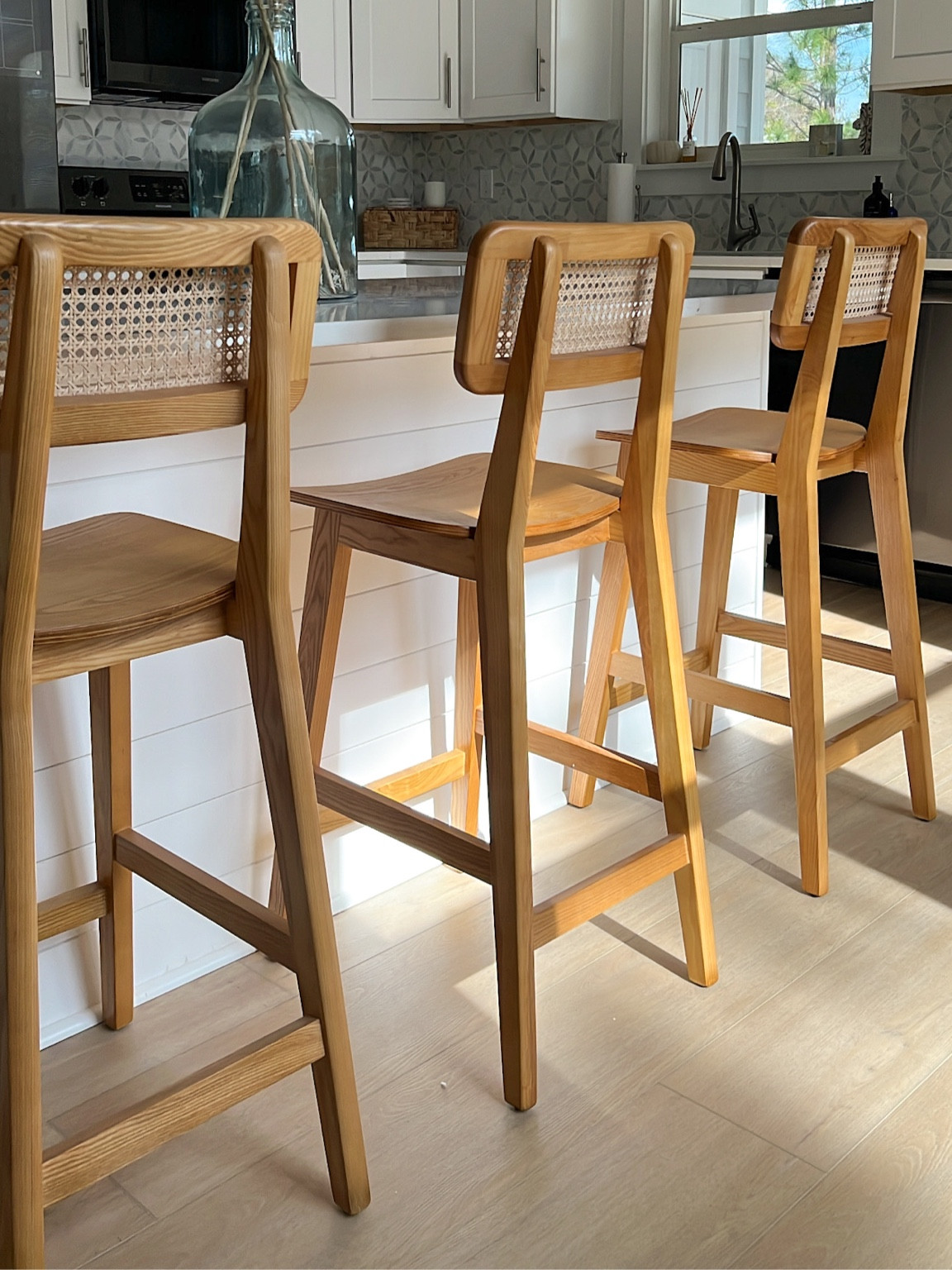 upgraded our barstools and I couldn’t be more obsessed!! love the natural wood color + rattan detail✨ 

#LTKstyletip #LTKGiftGuide #LTKhome