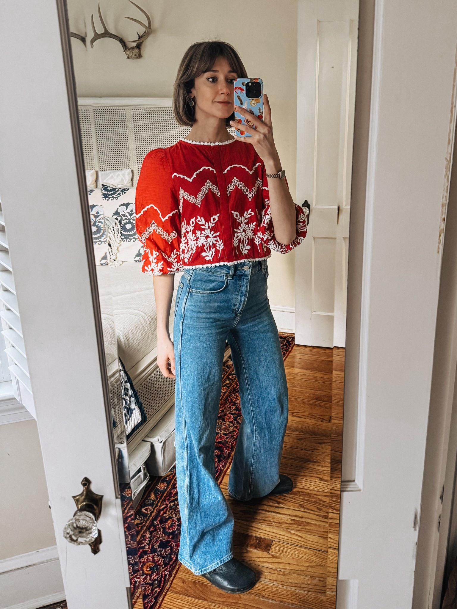 A backyard gang outfit with this eye-catching red embroidered top & wide leg jeans. 

#LTKOver40 #LTKootd #LTKSeasonal