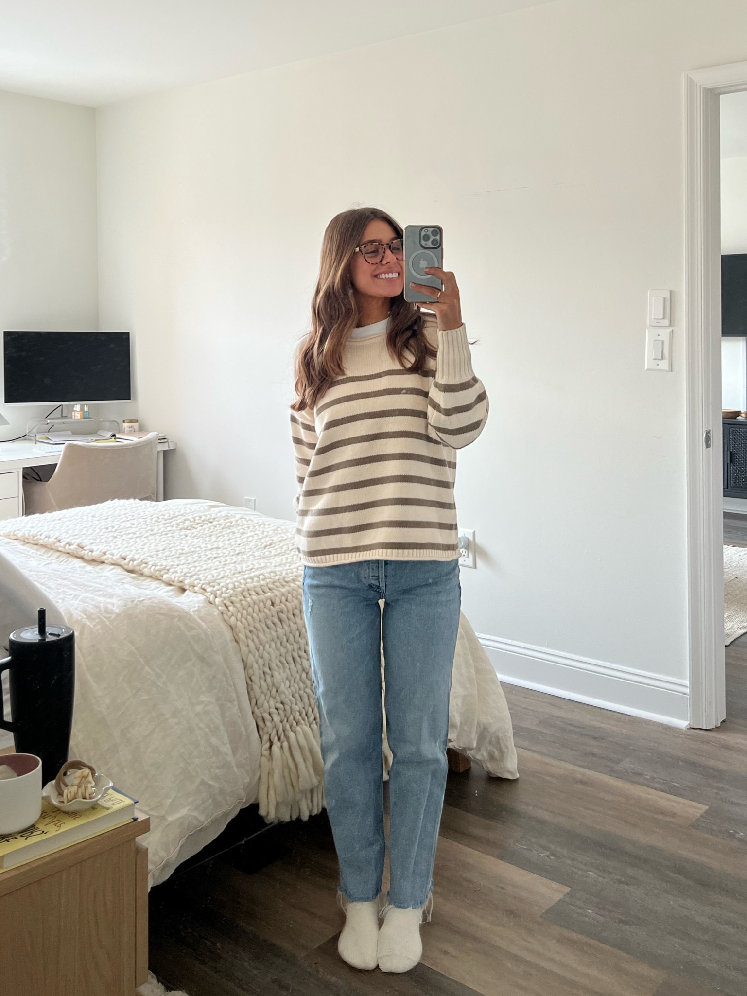 Wearing size 25 in the denim, size XS in the sweater, and wearing a random Abercrombie white tee underneath!
