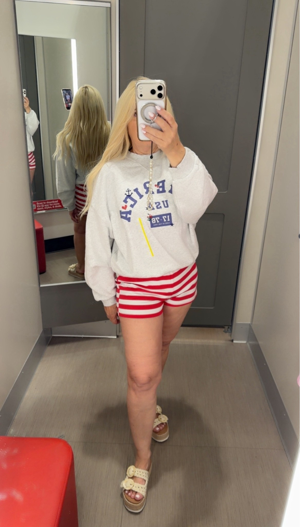 Cute patriotic outfit idea featuring an America sweatshirt and striped shorts. Perfect comfortable Memorial Day weekend outfit for cookouts, beach trips, travel days and casual summer plans.

#LTKPetite #LTKSeasonal #LTKootd