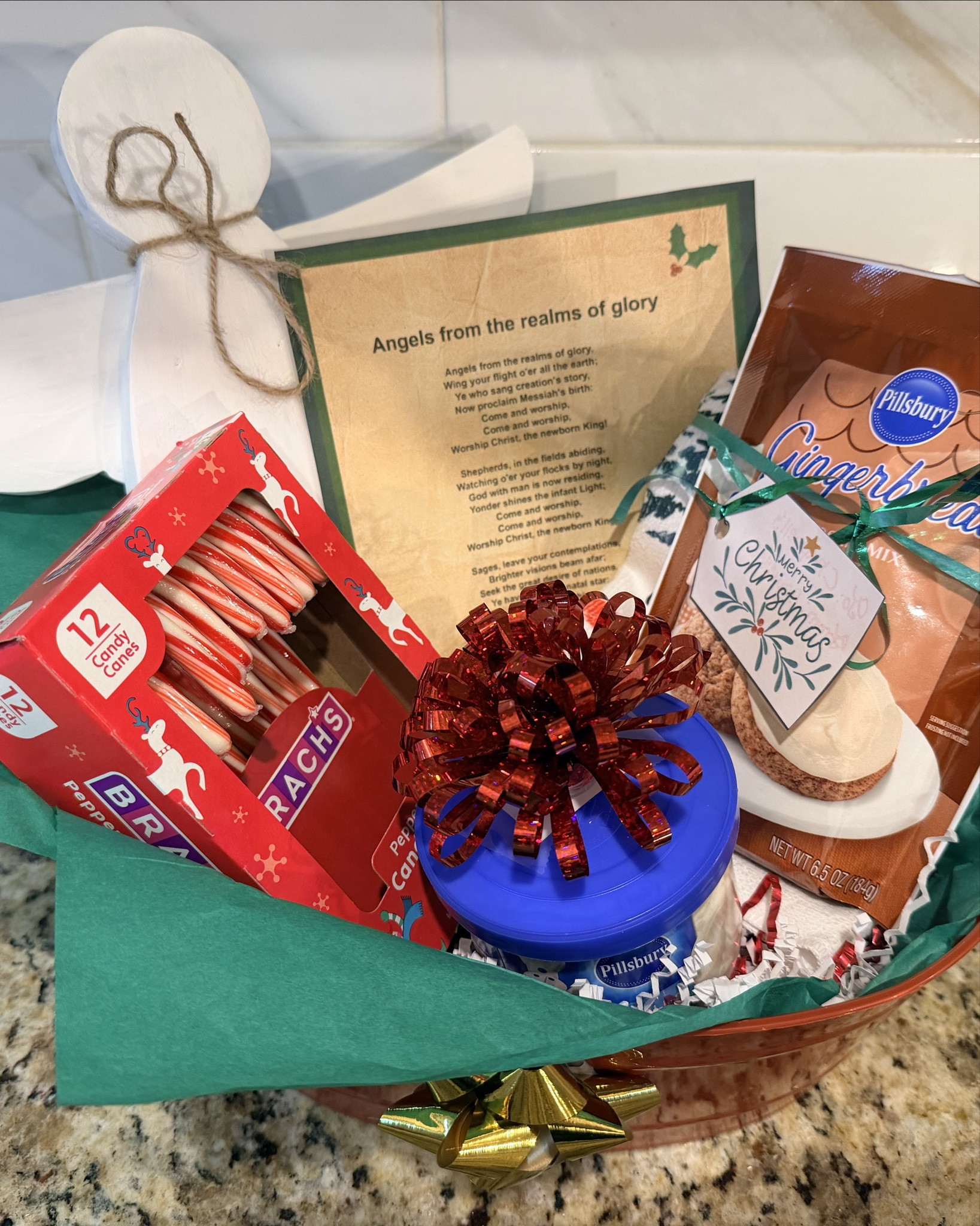 Made this Christmas gift basket for one of my ministering sisters who happens to be a long distance cousin.  My husband made the Angel out of wood & painted it . I went on Pinterest & printed out THE ANGELS paper to go with it . 

#LTKGiftGuide #LTKHoliday #LTKCyberWeek