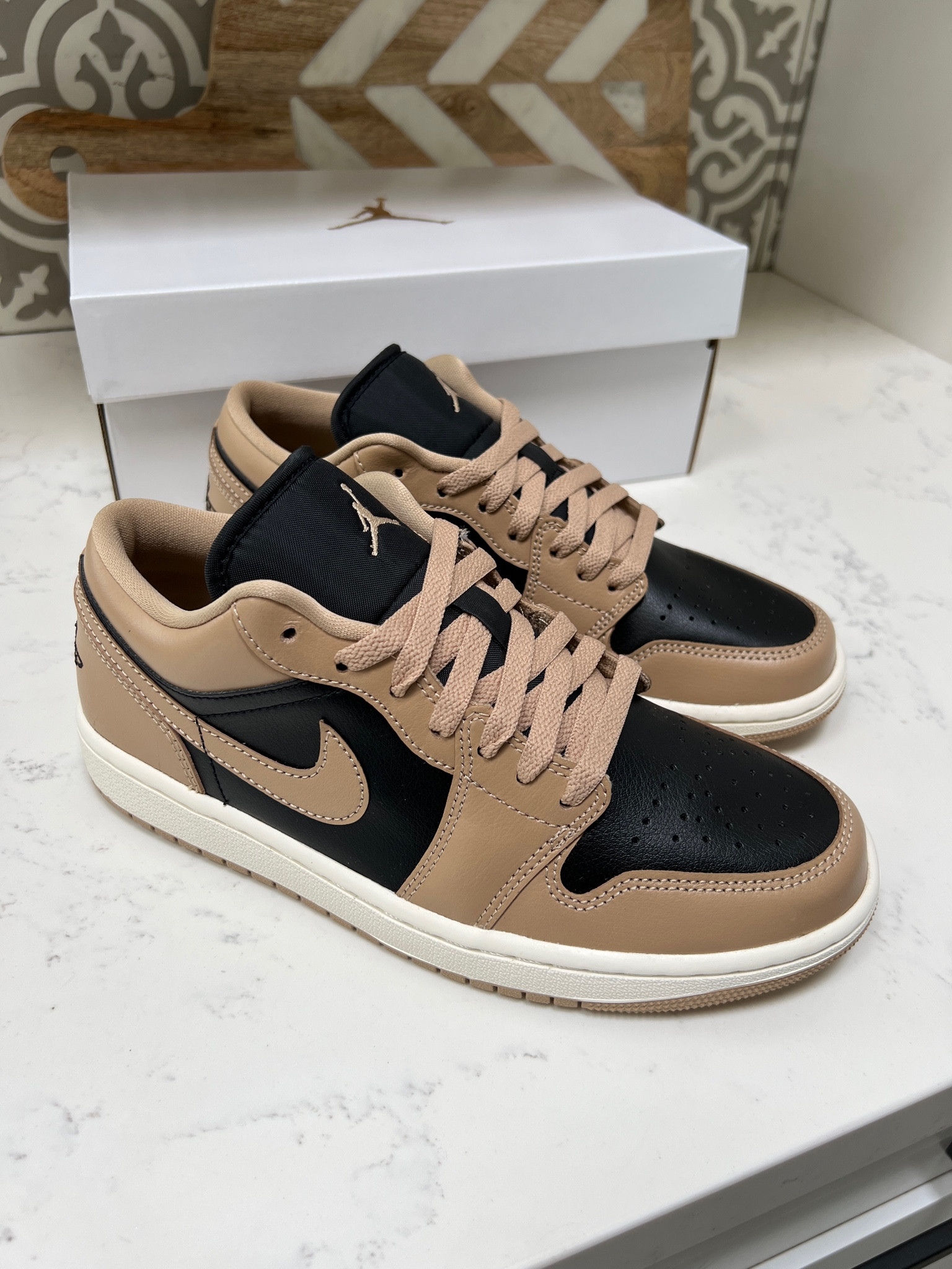 Womens Nike air jordan sneakers neutral sneakers beige tan black tennis shoes Jordan’s 

#LTKstyletip #LTKSeasonal #LTKshoecrush