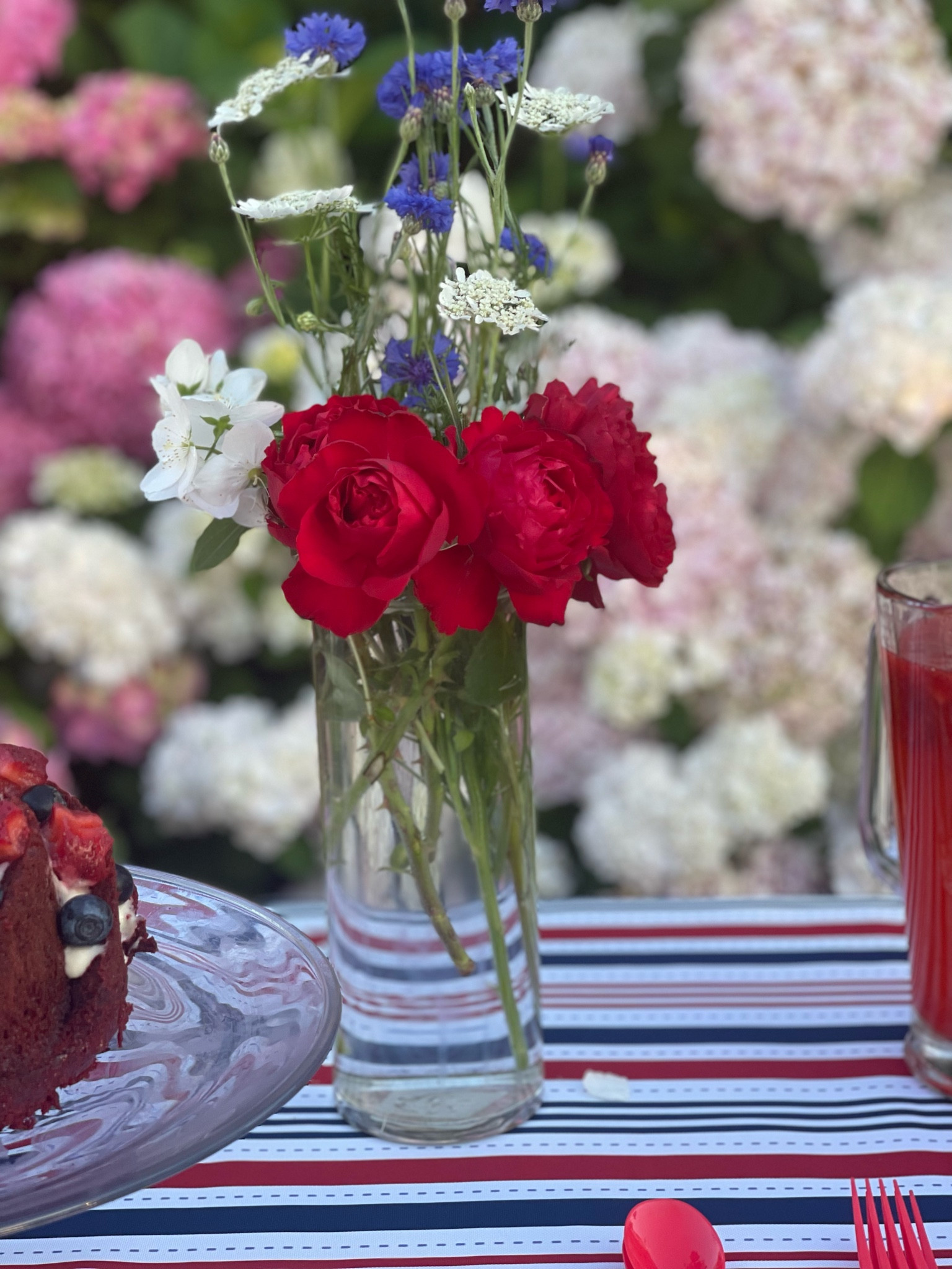4th of July bouquet. 4th of July flowers. Beautiful glass vase for flowers. Red white and blue tablecloth. Fourth of July tablecloth. ❤️🤍💙

#LTKhome #LTKFind #LTKunder50