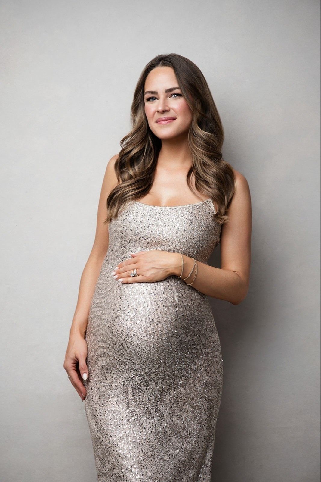 The Rossa Maxi from Revolve is lightweight with great movement, which makes it ideal for photoshoots. The fabric photographs well and highlights just enough of the sparkle from the sequins seen into the gown. It works especially well for maternity or motherhood portraits where you want something elegant, timeless and comfortable.#maternityfashion #maternitygown #bumpfashion #bumpstyle 

#LTKBump #LTKBeauty #LTKStyleTip