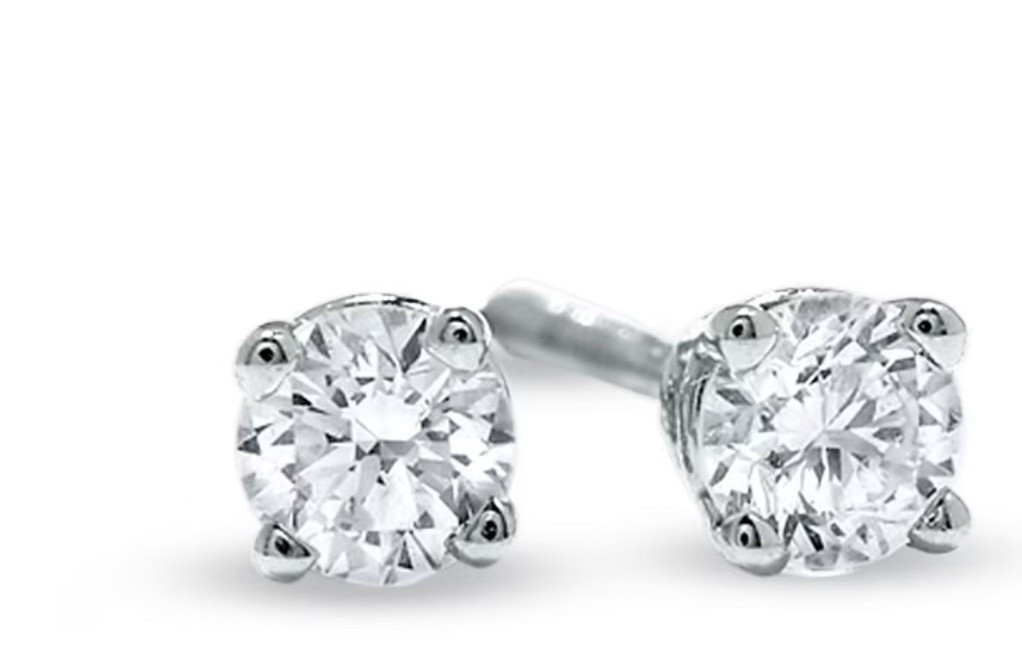 Dress your ears in eye-catching beauty when you wear these classic and petite diamond solitaire stud earrings in white gold.Crafted in 14K white goldEach earring showcases a stunning diamond solitaire in timeless four-prong setting.Captivating with 1/4 ct. t.w. of diamondsThese post earrings secure comfortably with screw backs.

#LTKGiftGuide #LTKHoliday