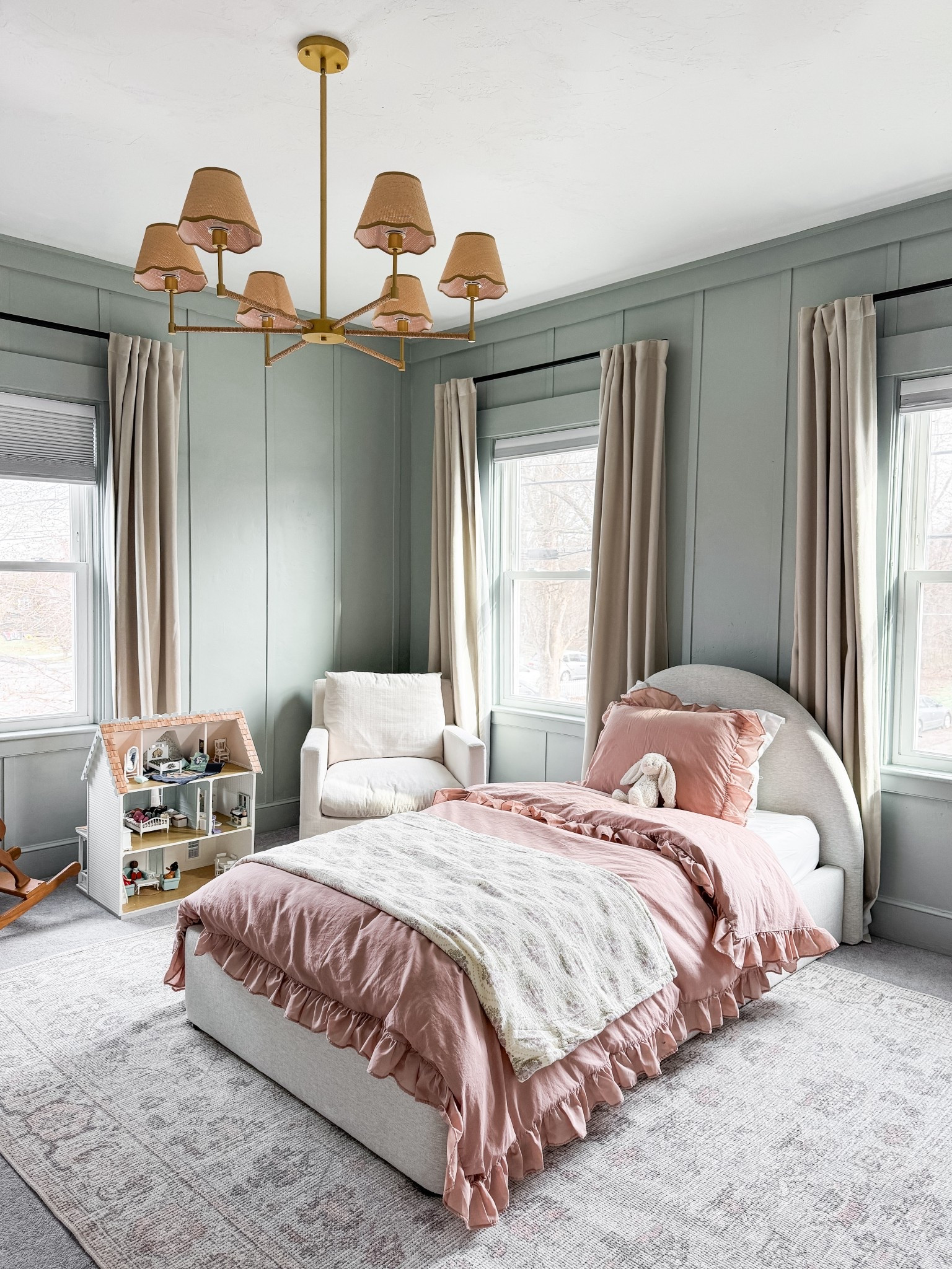 Girls bedroom, pink bedding, blue wall bedroom, brass light fixture. 

#LTKKids #LTKHome