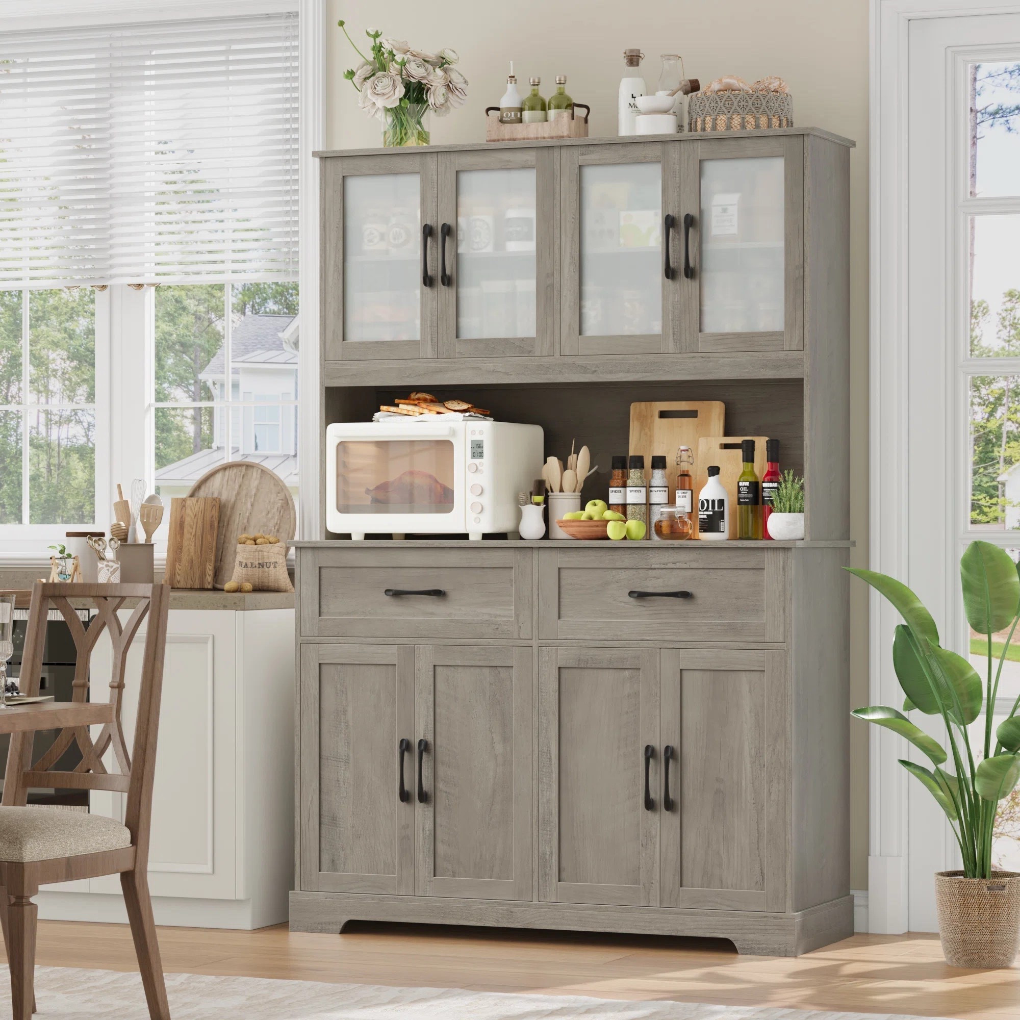 Create cozy morning routines with the family with a beautiful new kitchen cabinet. The Kyale 70.9"H Stand Alone Kitchen Pantry With Microwave Shelf & Drawers, Wood Storage Pantry Cabinet With Adjustable Shelves, Wash Gray is ON SALE and under $300.

Keywords: Kitchen cabinet, kitchen cabinet with drawers, kitchen cabinet with hutch, kitchen organizer, farmhouse kitchen cabinet, kitchen refresh, kitchen pantry, cabinet with storage, home refresh, china cabinet, corner curio 

#LTKSeasonal #LTKHome #LTKSaleAlert