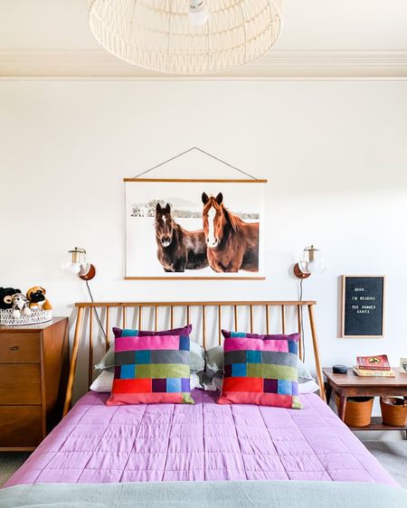 Avery doesn’t love color as much as I do, but I love that she still wanted some pops of color in her space! 🌈 #midcenturymodern #bedroom #tweenbedroom #girlsbedroom #colorfulbedding #throwpillow #comforter #nightstand #dresser #sconces #horseart 

#LTKhome