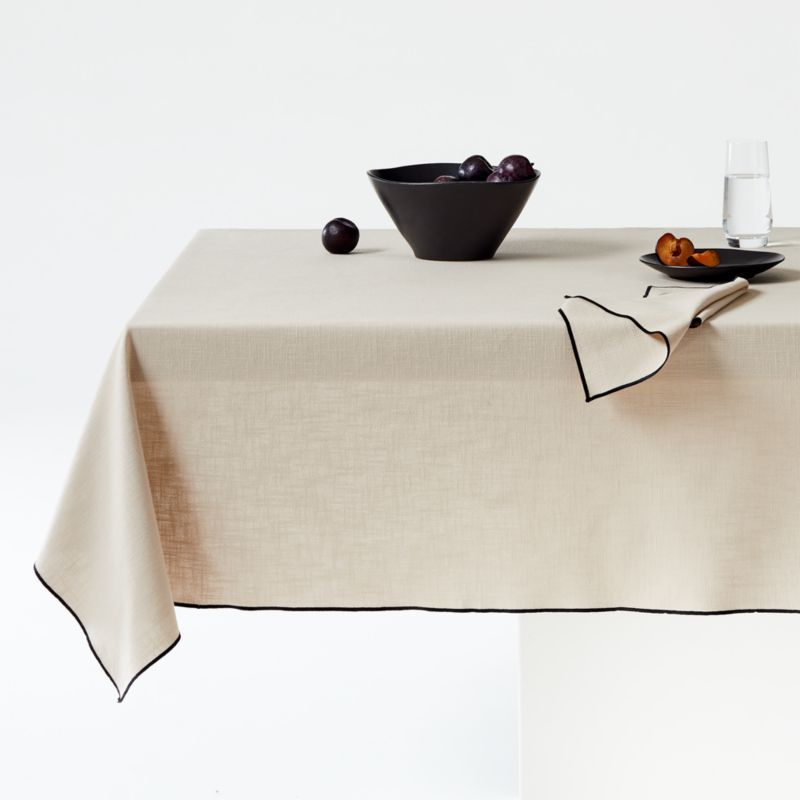 Merrow Stitch Warm Natural Organic Cotton Tablecloth 60"x120". + Reviews | Crate & Barrel | Crate & Barrel