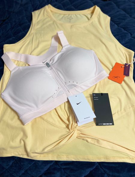 Freely twist top in yellow and Nike Alpha Bra in pink. 

#LTKunder50 #LTKfit #LTKunder100